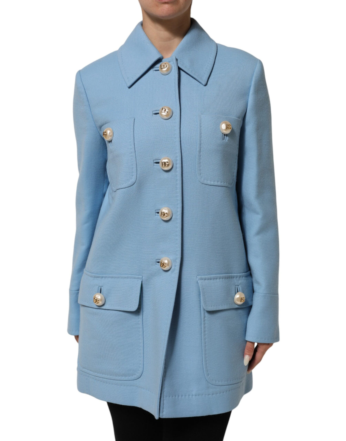 Discover the Dolce & Gabbana Blue Buttoned Down Trench Coat, a masterpiece of Italian craftsmanship in luxurious wool, embodying timeless elegance and sophistication.