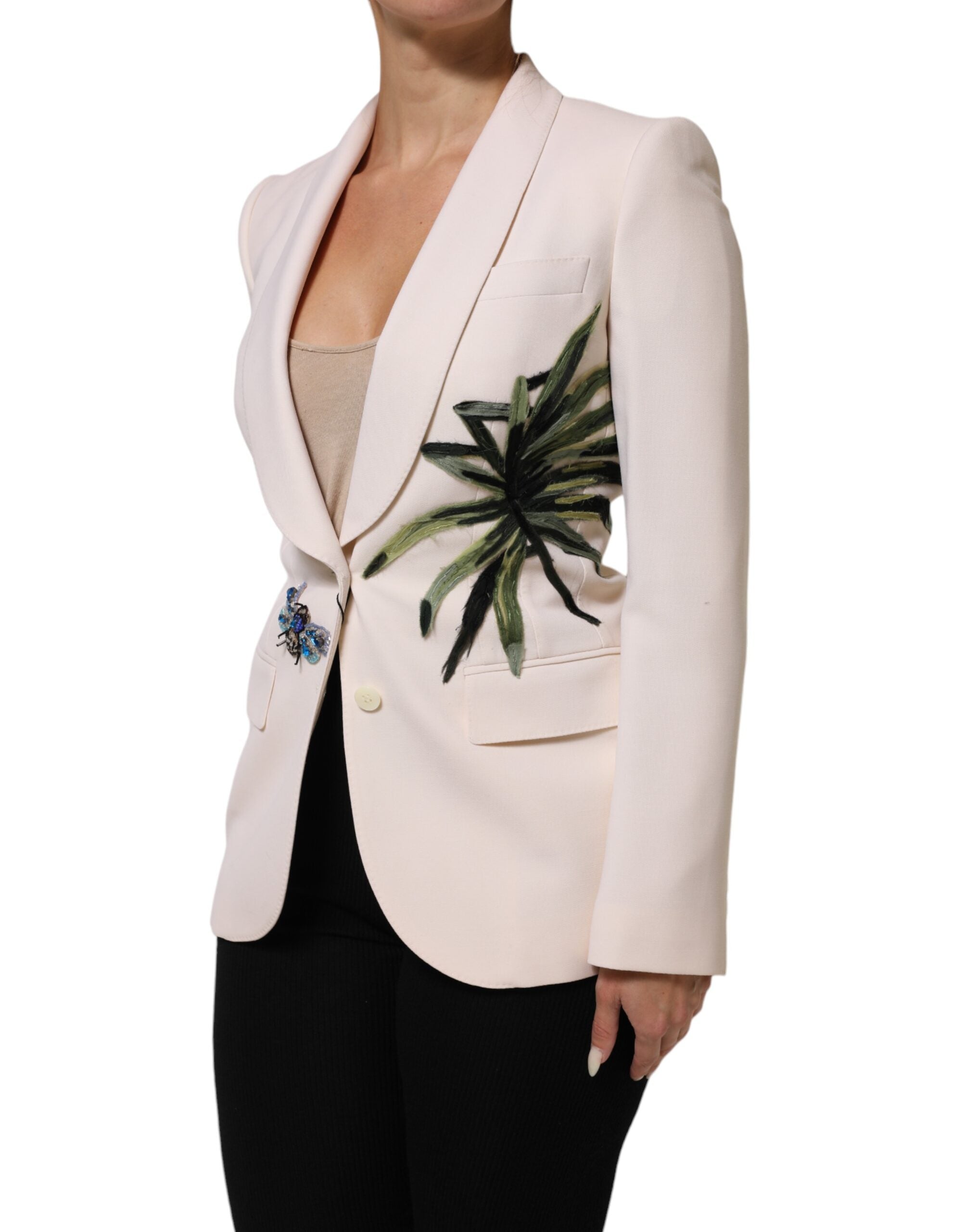 Elevate your wardrobe with the Dolce & Gabbana Beige Embroidered Single Breasted Jacket, a masterpiece of Italian craftsmanship in luxurious wool, perfect for the discerning individual.