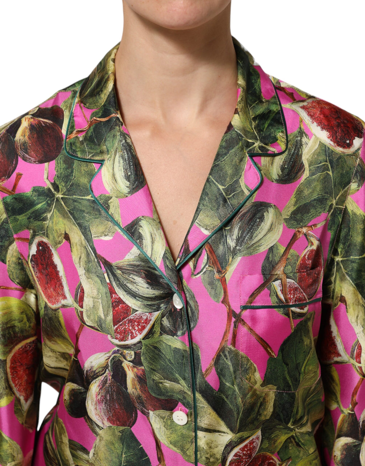Indulge in the exquisite Dolce & Gabbana Hot Pink Fig Printed Silk Shirt Blouse Top, a masterpiece of Italian craftsmanship that embodies timeless elegance and playful sophistication.