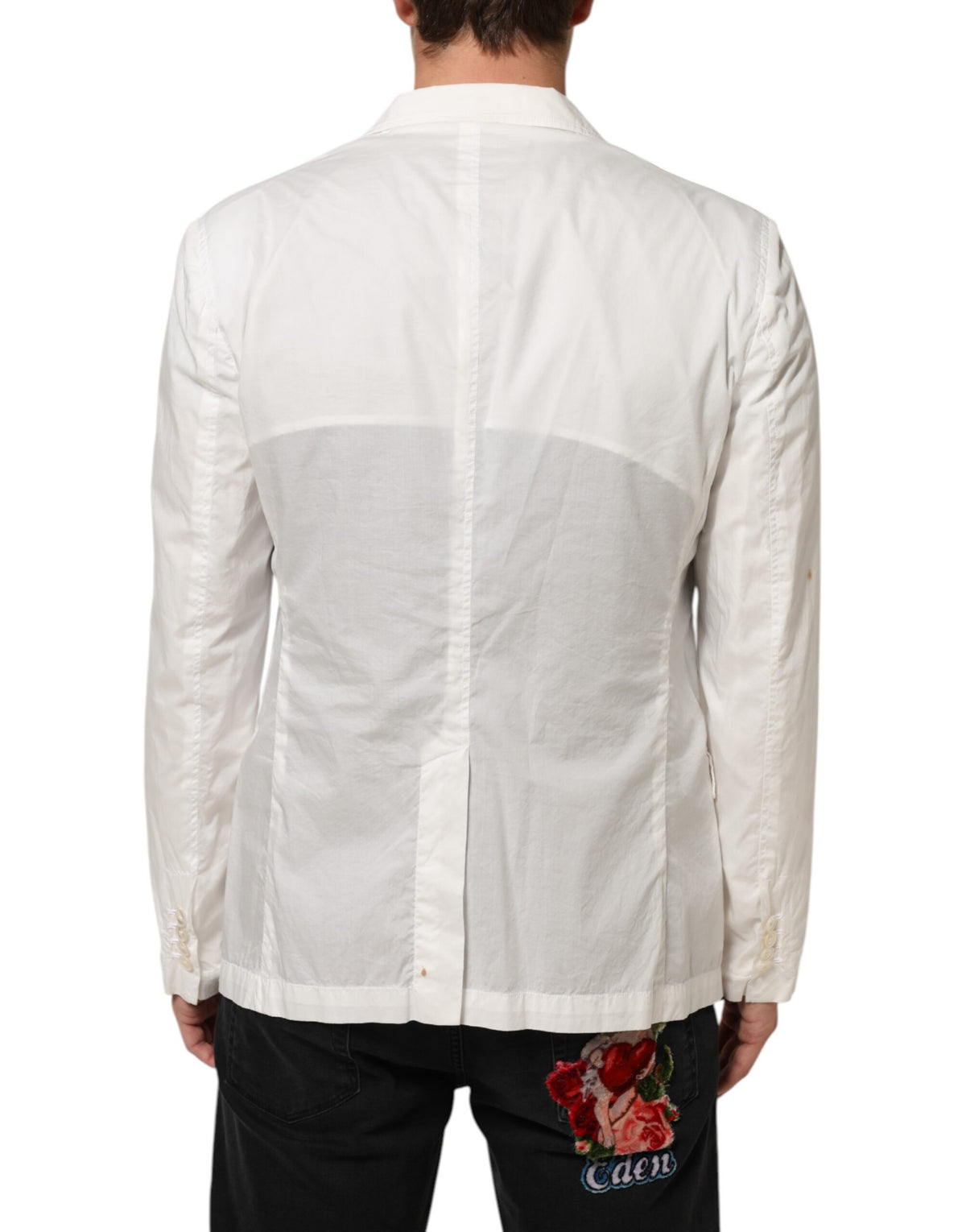 Elevate your wardrobe with the Dolce & Gabbana White Cotton 1 Button Men Suit Blazer, crafted from premium cotton, embodying timeless elegance and sophisticated allure.