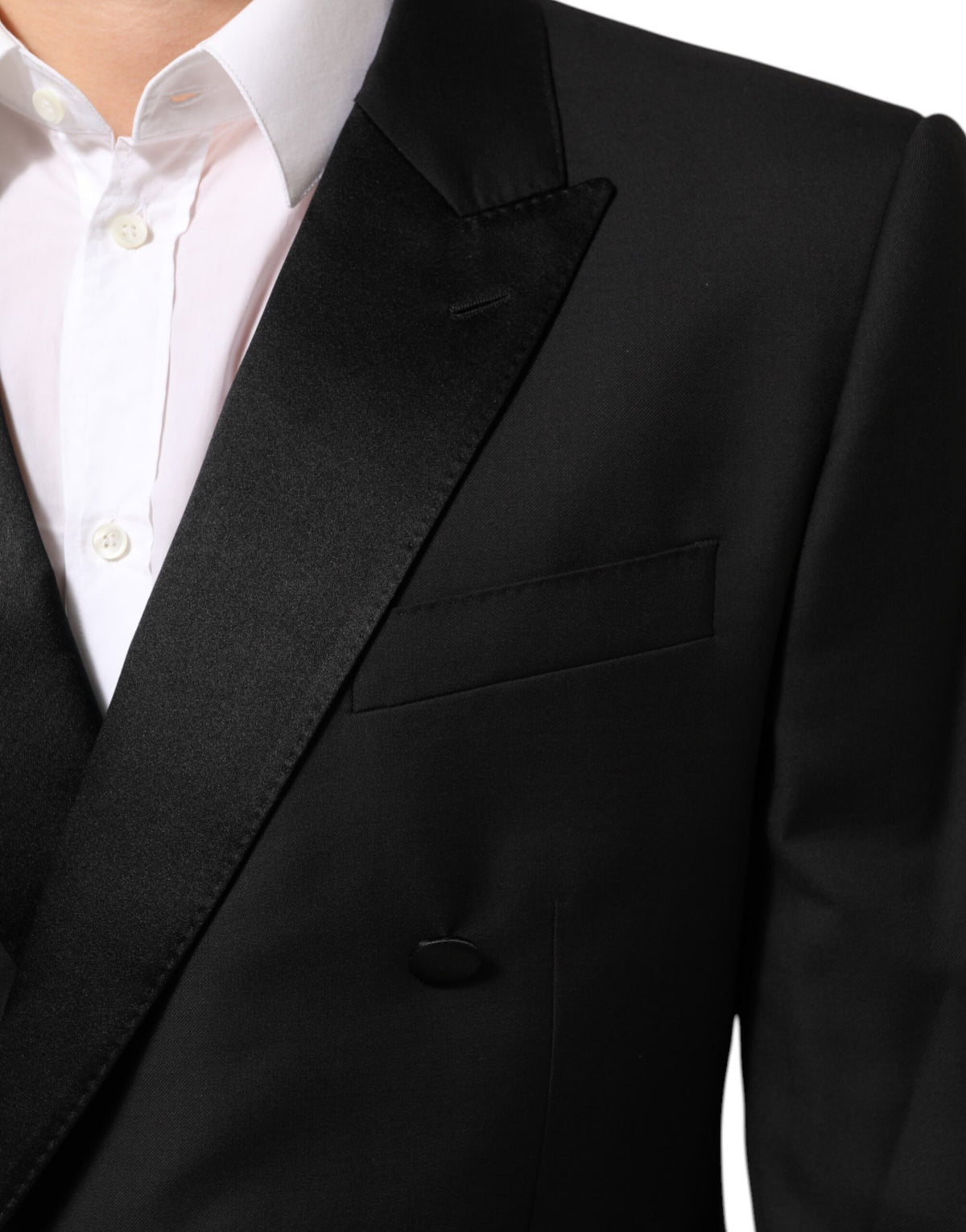 Elevate your wardrobe with the Dolce & Gabbana Black MARTINI Double-Breasted Suit Blazer, a masterpiece of Italian craftsmanship that embodies timeless elegance and sophisticated allure.