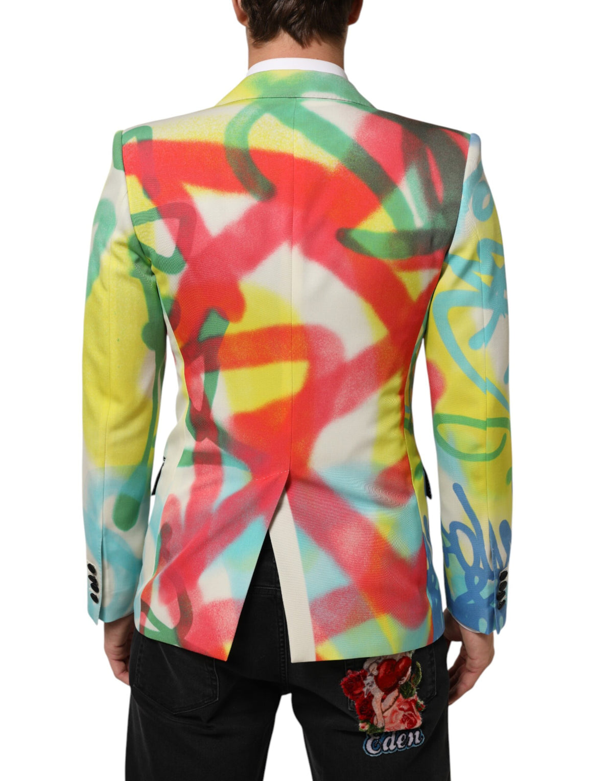 Elevate your style with the Dolce & Gabbana Multicolor Graffiti SICILIA Blazer, a masterpiece of Italian craftsmanship, blending luxurious materials with avant-garde design for the discerning individual.