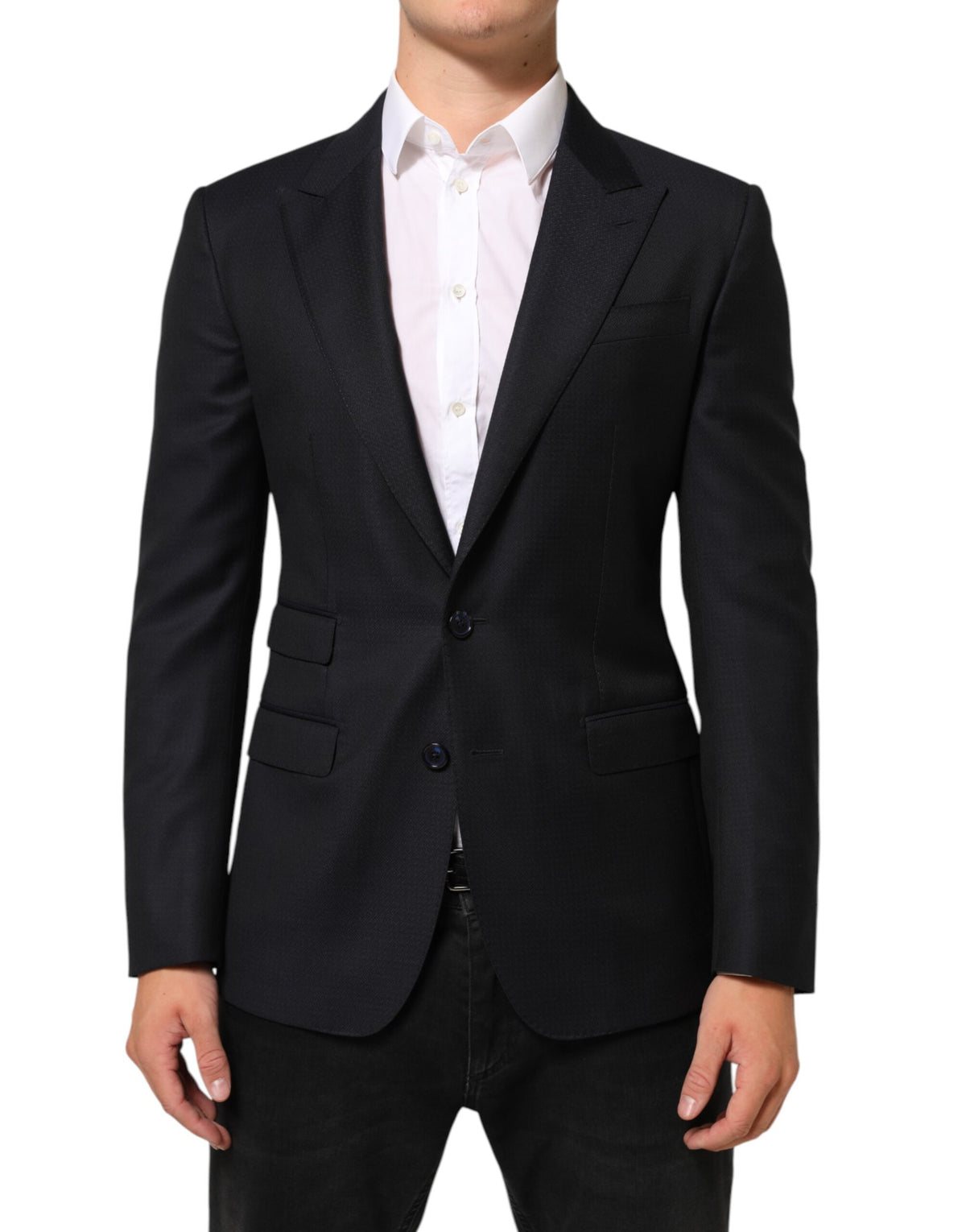 Indulge in the exquisite Dolce & Gabbana Black Wool NAPOLI Blazer, a testament to Italian craftsmanship that embodies timeless elegance and sophistication for the discerning individual.
