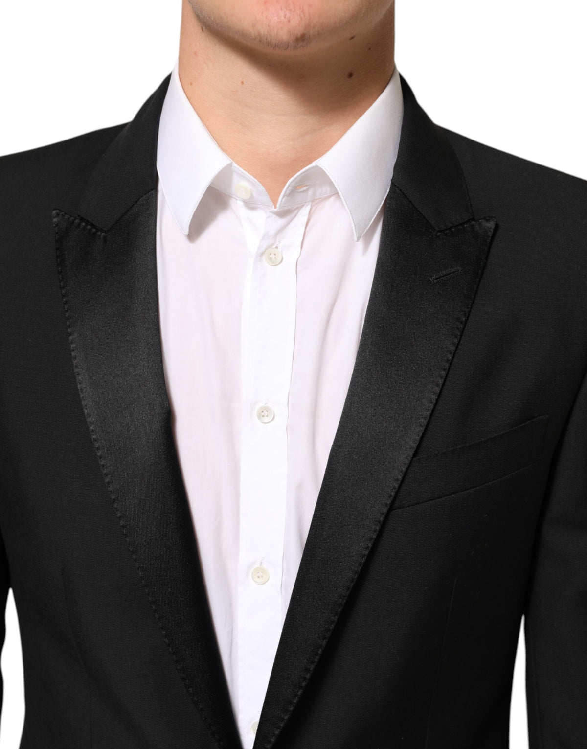 Elevate your style with the Dolce & Gabbana Black Wool MARTINI Blazer, a masterpiece of luxury craftsmanship, blending exquisite materials for timeless elegance.