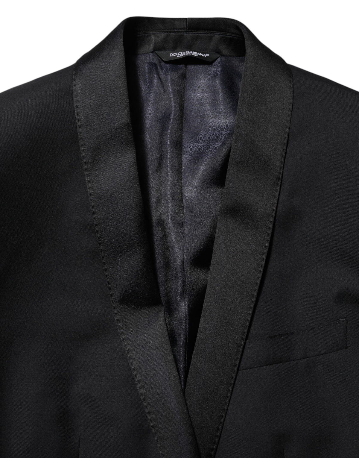 Elevate your wardrobe with the Dolce & Gabbana Black GOLD 1 Button Suit Jacket, a masterpiece of Italian craftsmanship that embodies sophistication and timeless elegance.