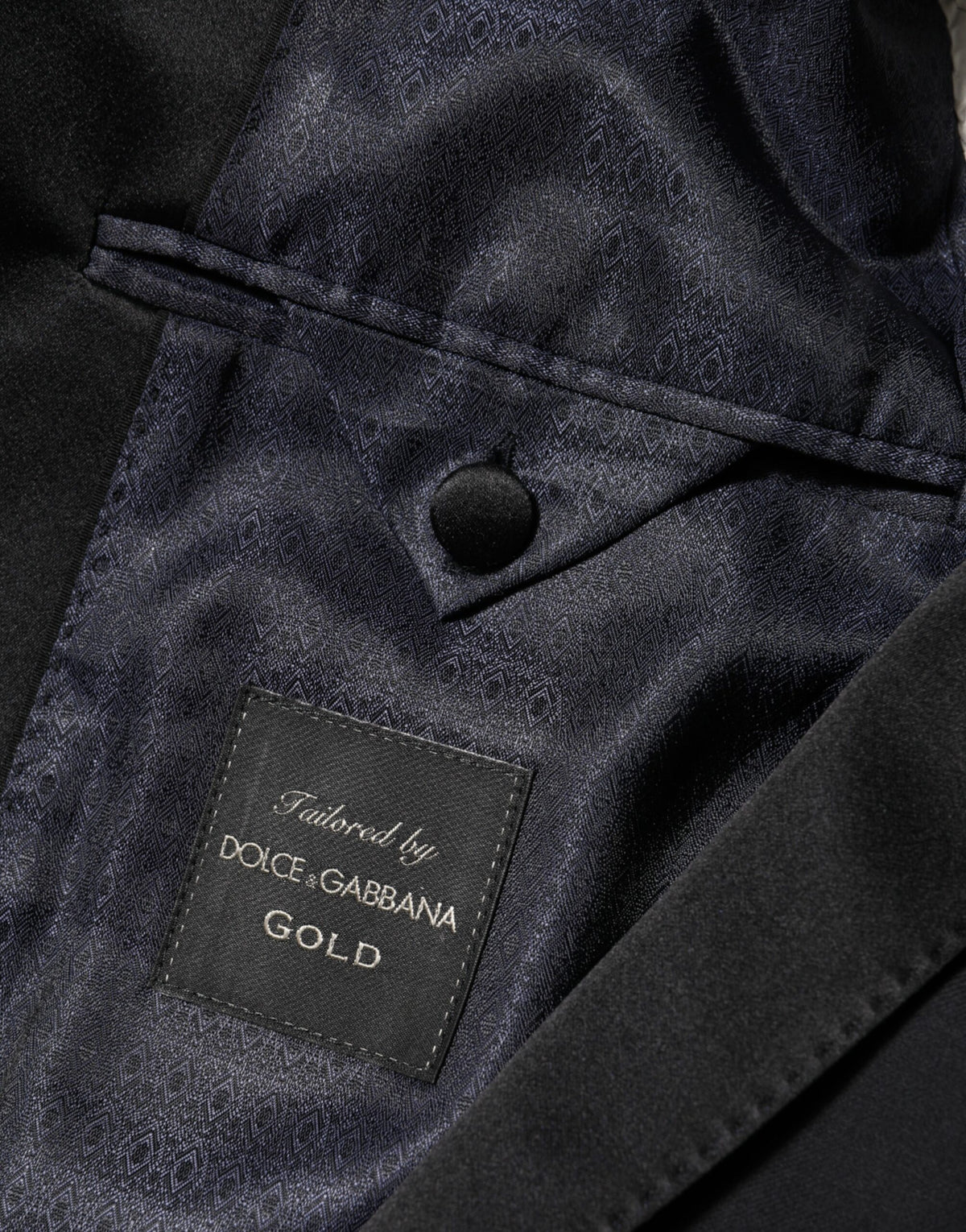Discover the Dolce & Gabbana Black GOLD 1 Button Suit Jacket, a masterpiece of Italian craftsmanship blending luxurious materials for an unparalleled elegance that defines your presence.