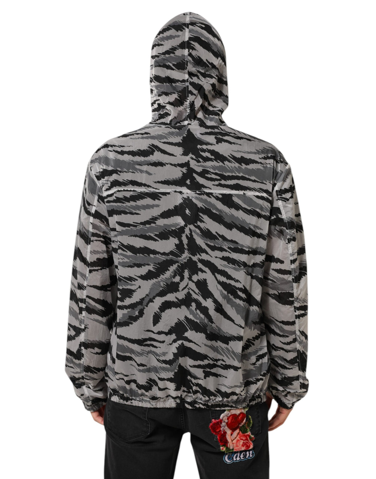 Indulge in the Dolce & Gabbana Gray Camouflage Hooded Sweatshirt Jacket, crafted from premium polyamide, merging urban elegance with timeless luxury for the discerning individual.