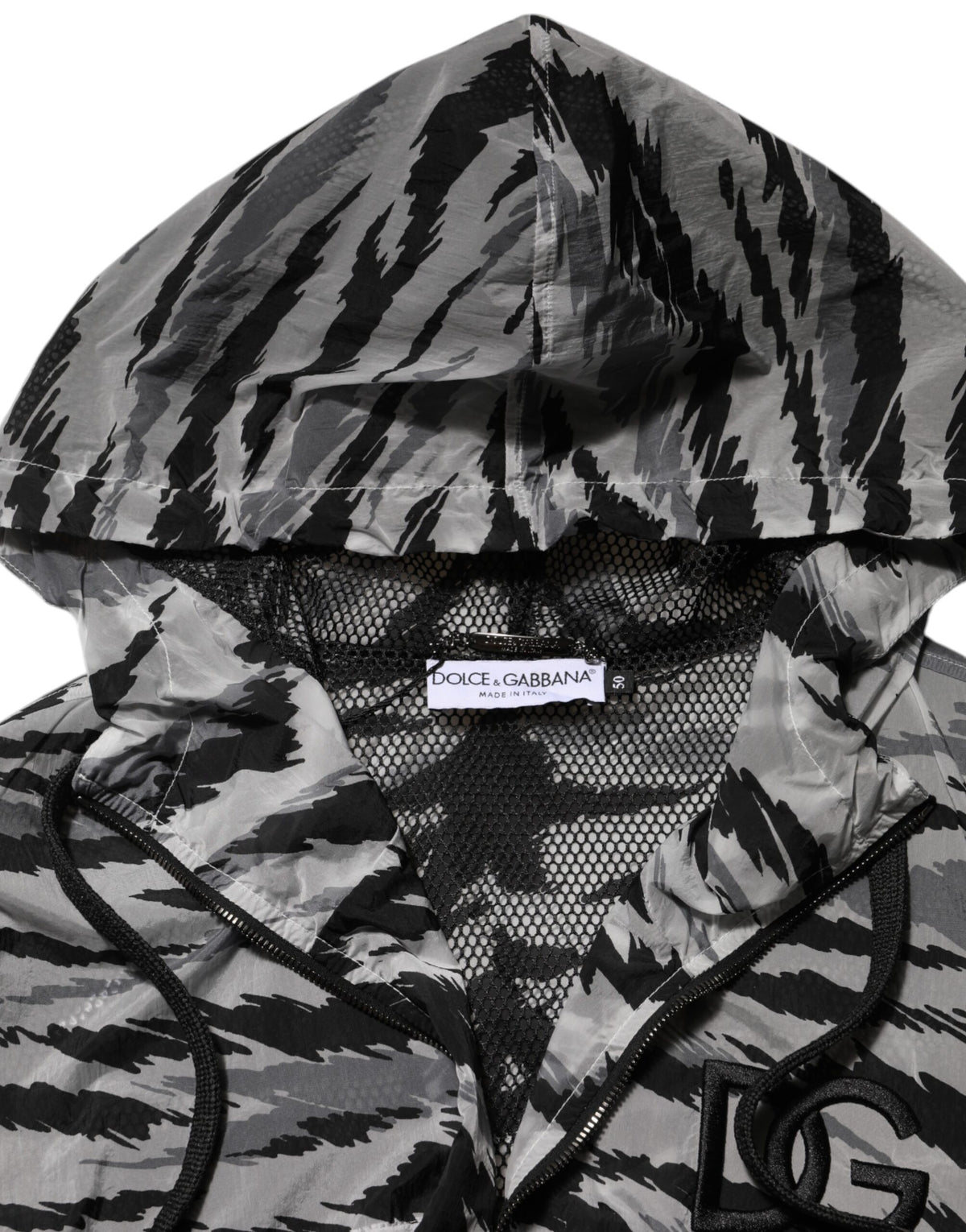 Indulge in the Dolce & Gabbana Gray Camouflage Hooded Sweatshirt Jacket, a luxurious blend of urban elegance and Italian craftsmanship, perfect for the discerning fashion connoisseur.