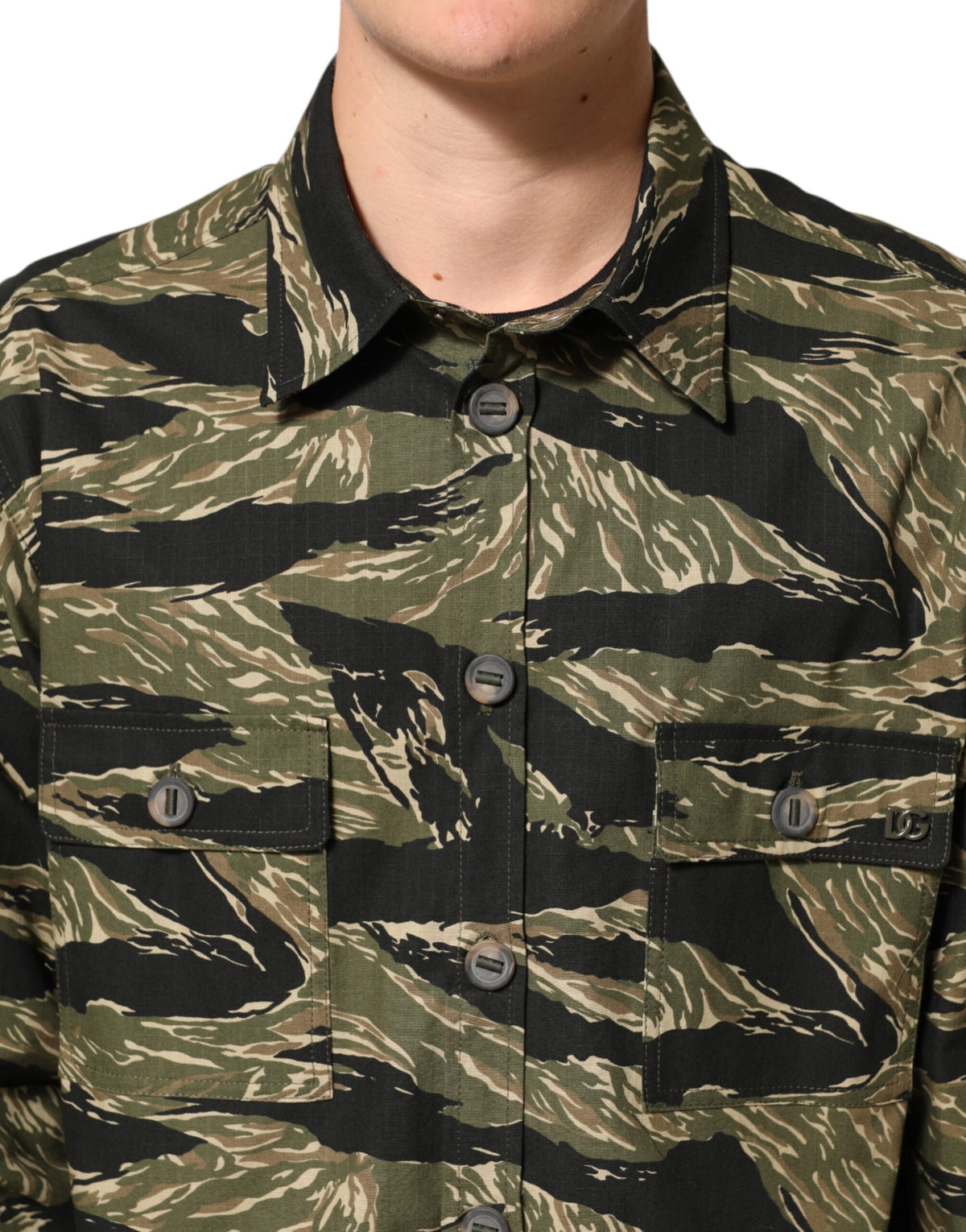 Experience the allure of Dolce & Gabbana's Multicolor Camouflage Cotton Casual Shirt, where exquisite craftsmanship meets bold design, perfect for the discerning individual.
