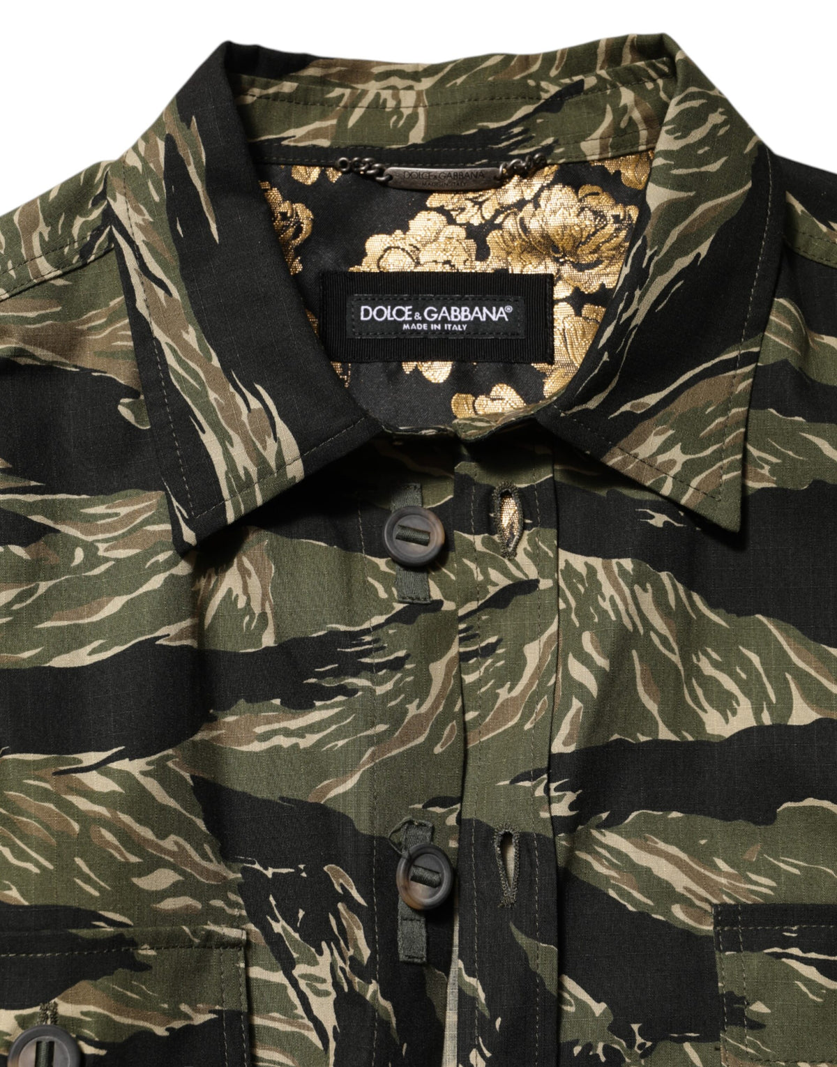 Experience the allure of Dolce & Gabbana's Multicolor Camouflage Cotton Casual Shirt, where exquisite craftsmanship meets bold design, perfect for the discerning individual.