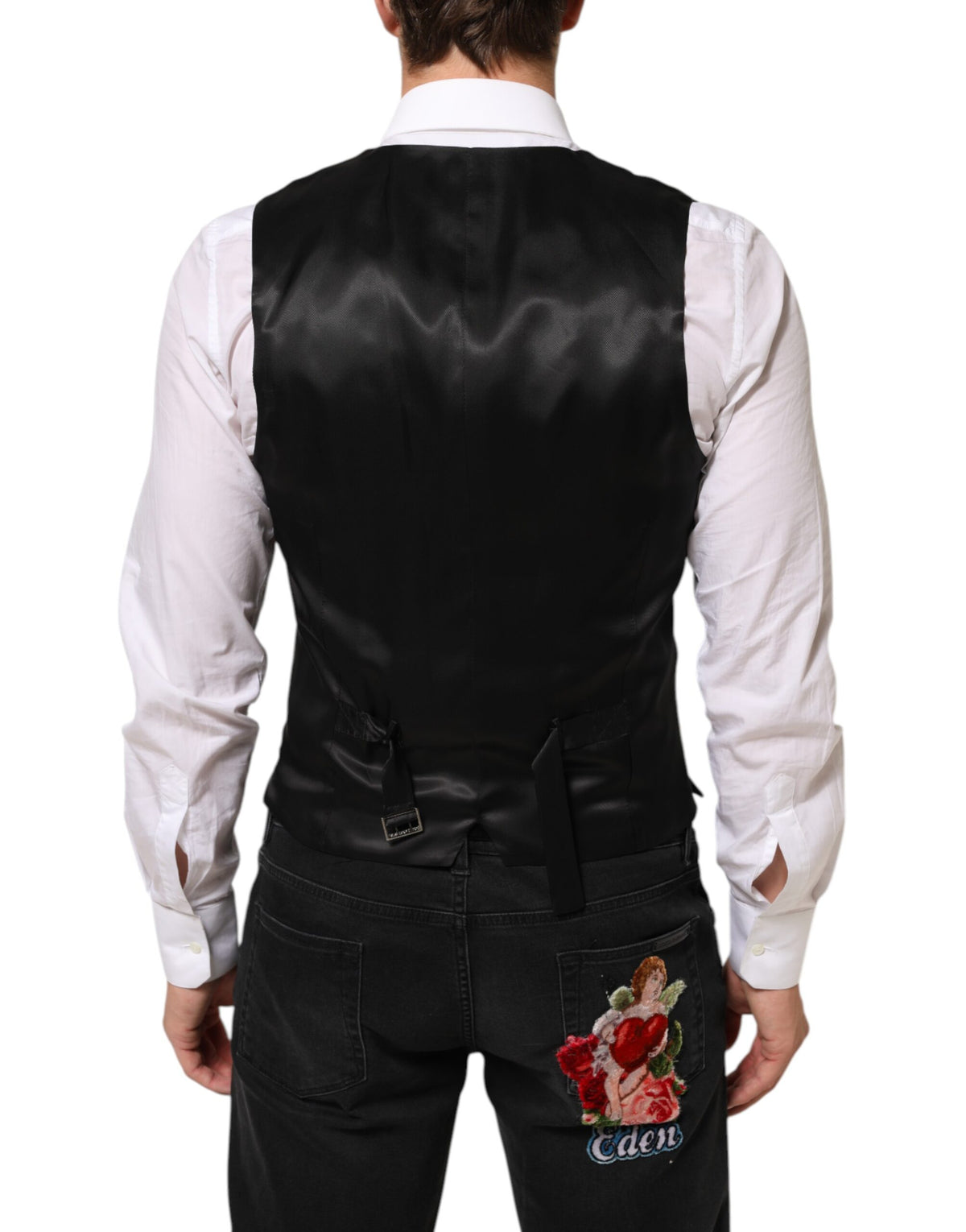 Indulge in the exquisite Dolce & Gabbana Black Wool Dress Formal Waistcoat Vest, crafted from premium wool, embodying timeless elegance and sophistication for discerning tastes.
