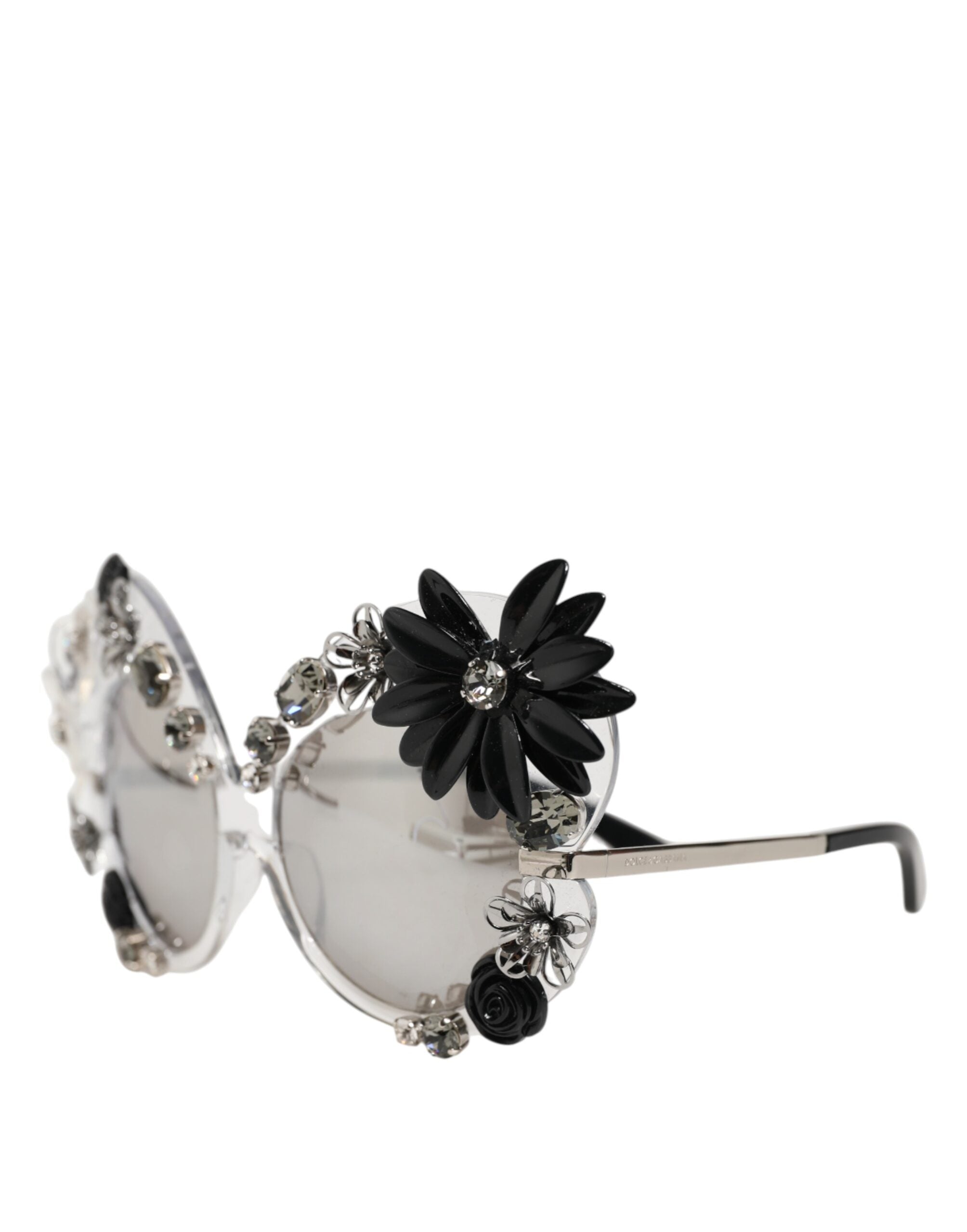 Indulge in the exquisite elegance of Dolce & Gabbana's Transparent DG4292 Round Crystal Flowers Sunglasses, where artisanal craftsmanship meets timeless luxury.
