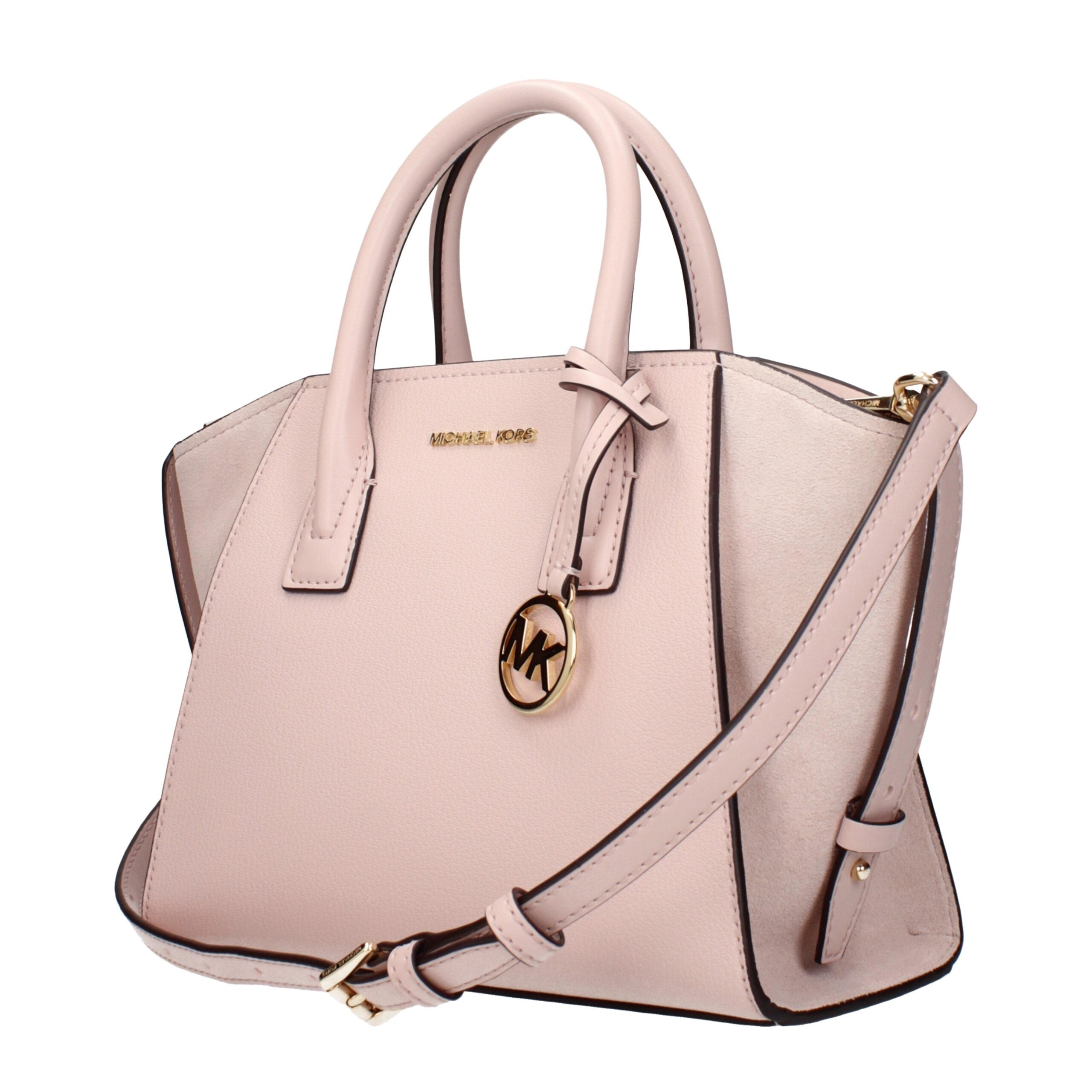 Discover the Michael Kors Pink Leather Handbag, a symbol of artisanal luxury that elevates your style with exquisite craftsmanship and timeless elegance.