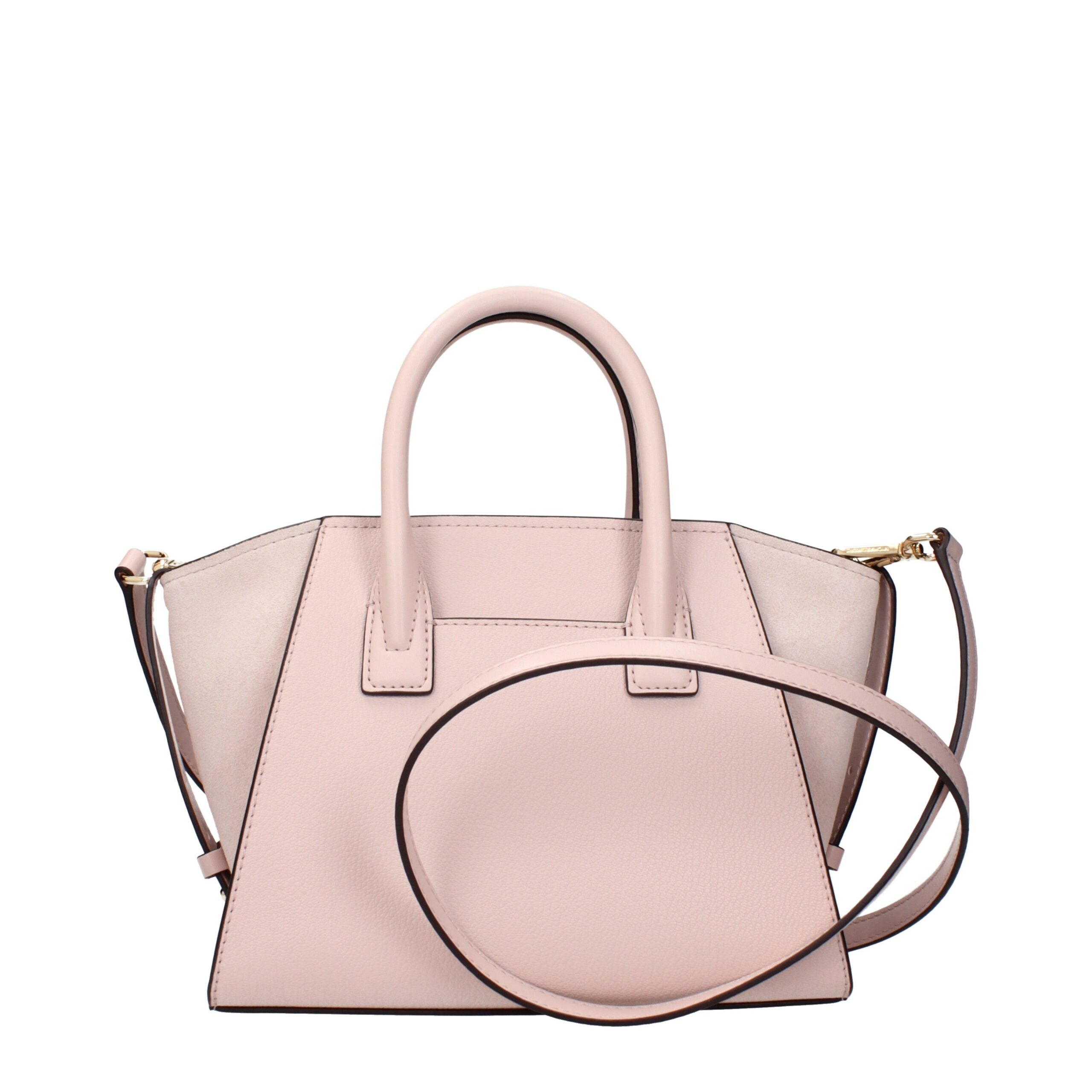 Discover the Michael Kors Pink Leather Handbag, a symbol of artisanal luxury and exquisite craftsmanship, perfect for elevating any sophisticated ensemble.