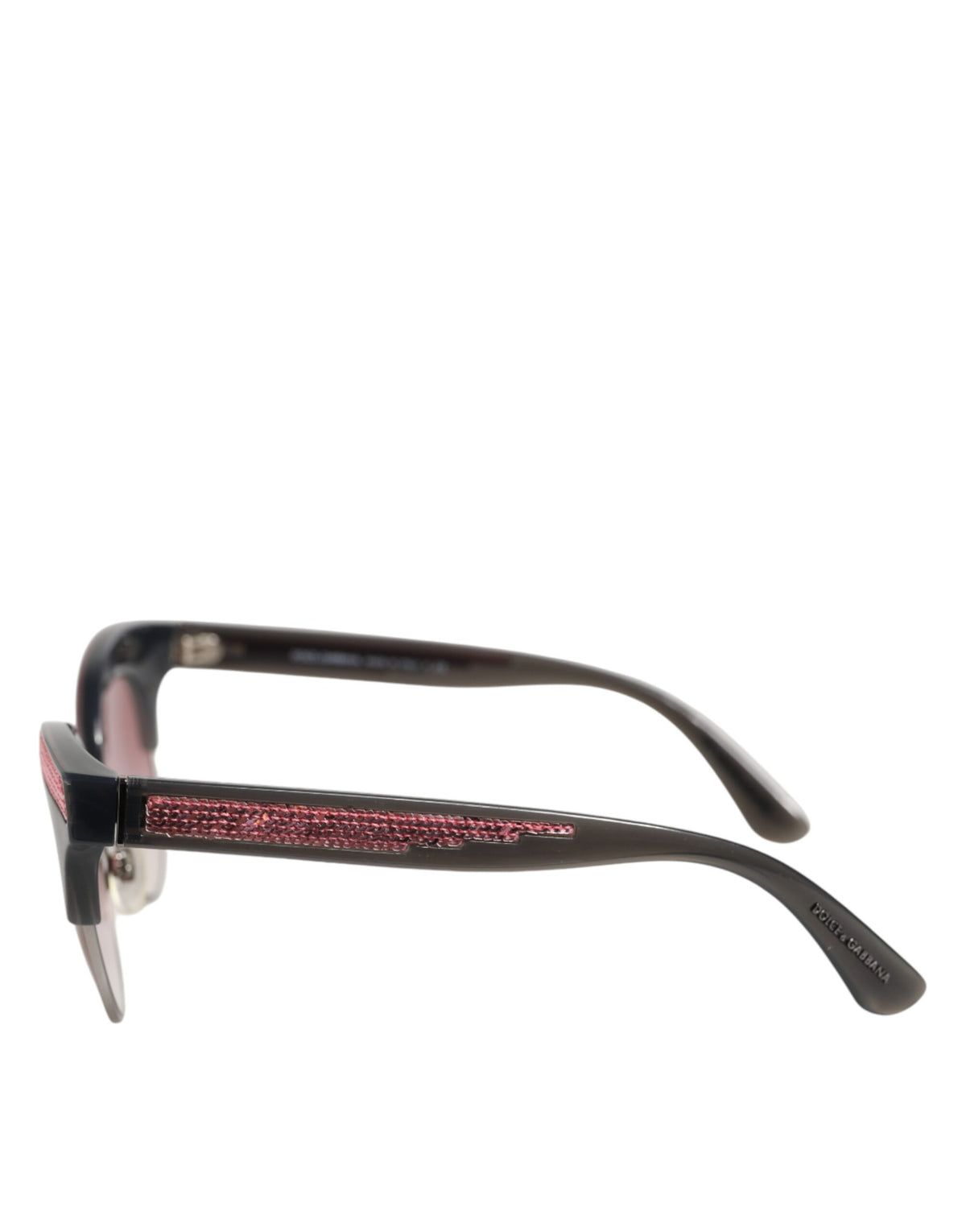 Indulge in the exquisite Dolce & Gabbana Black Pink Mirrored Cat Eye Sequined Sunglasses, where timeless elegance meets bold sophistication, elevating your style to new heights.