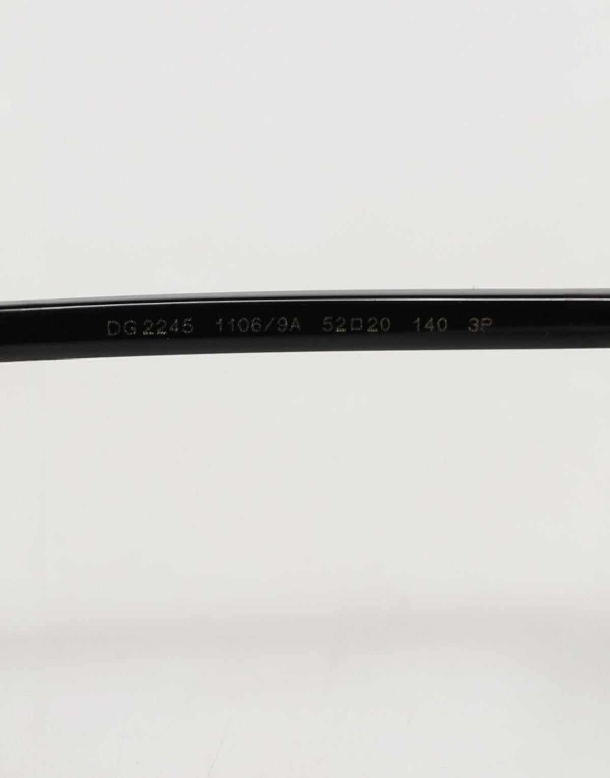 Indulge in the exquisite Dolce & Gabbana DG2245 sunglasses, where matte black steel meets luxurious gray lenses, embodying timeless elegance and Italian craftsmanship.