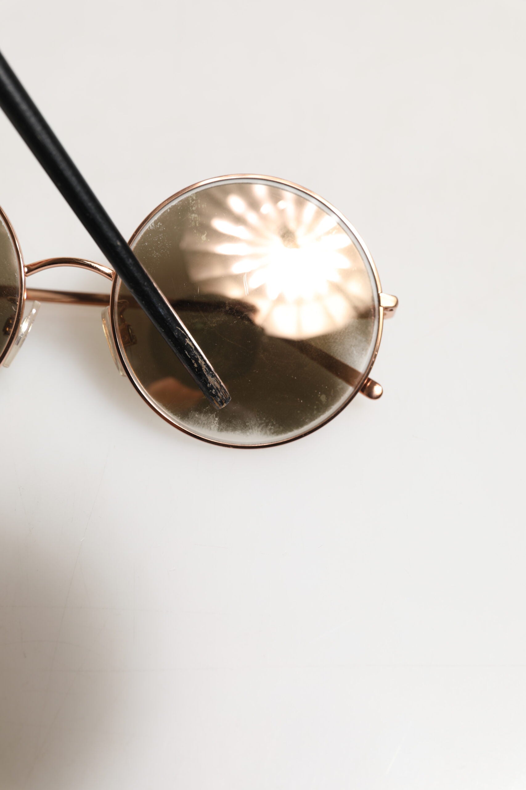 Indulge in the exquisite Dolce & Gabbana DG2215K Gold Metal Round Shades, where timeless elegance meets luxurious craftsmanship, perfect for the discerning connoisseur.