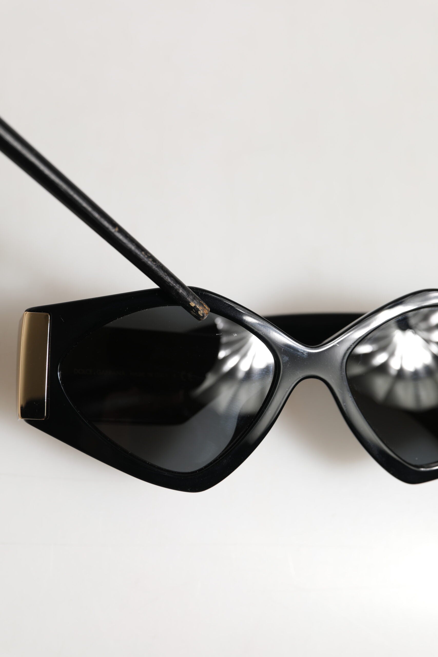Indulge in the exquisite Dolce & Gabbana DG4396 sunglasses, where luxurious acetate meets captivating gray gradient lenses, perfect for those who embody elegance and allure.