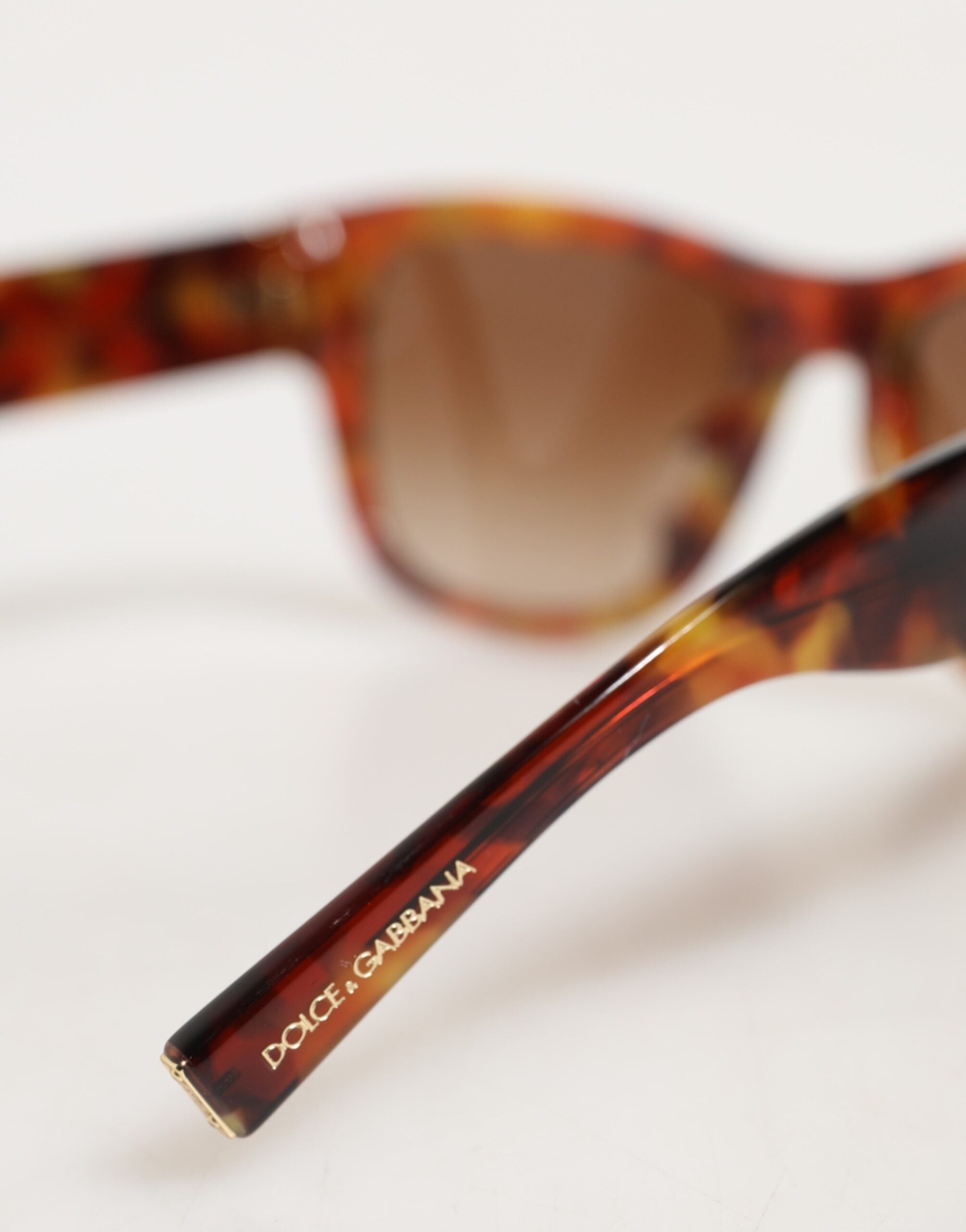 Indulge in the exquisite Dolce & Gabbana DG4338F sunglasses, where Italian craftsmanship meets timeless elegance, perfect for those who embody luxury and sophistication.