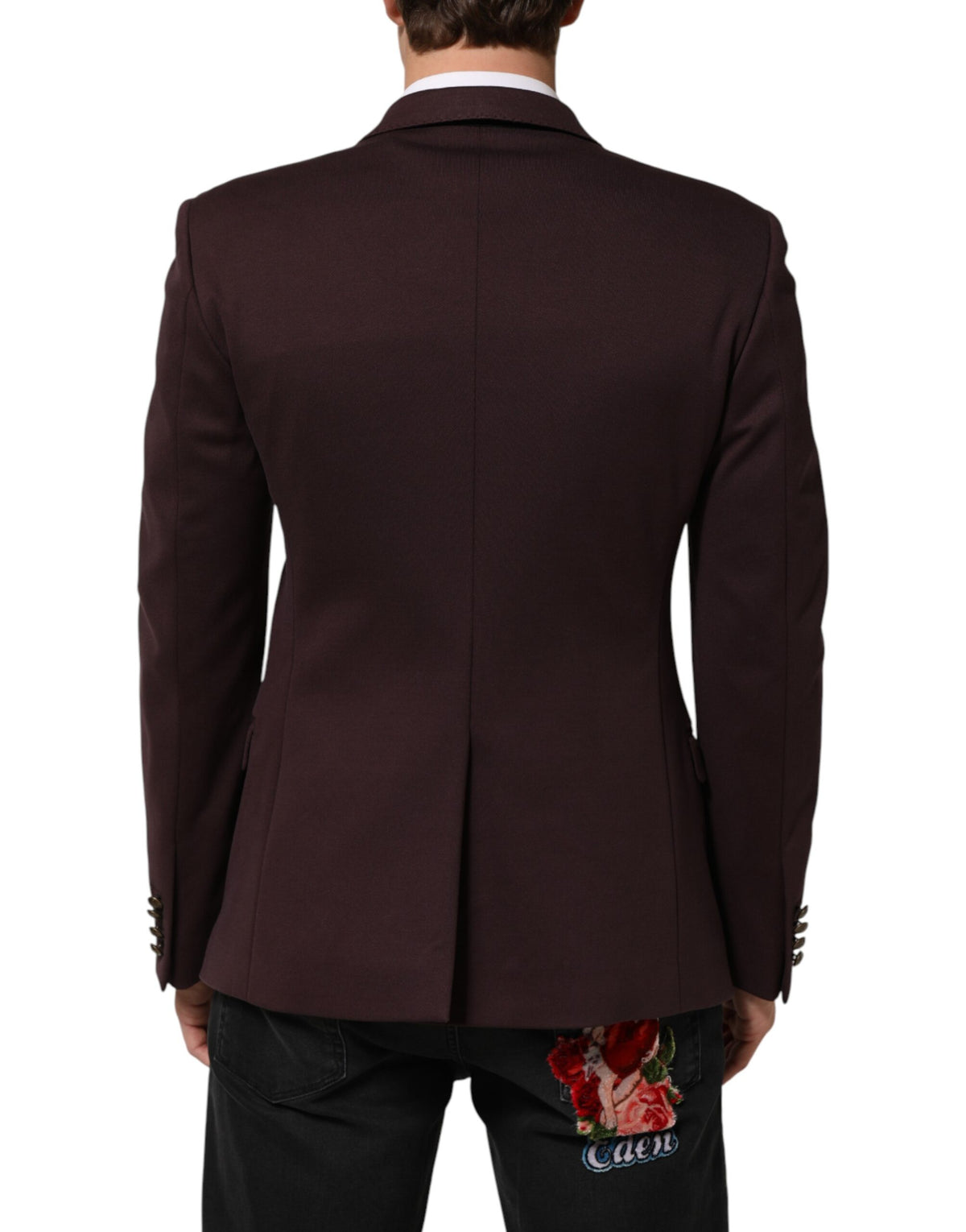 Elevate your wardrobe with the Dolce & Gabbana Maroon Cotton Blazer, a timeless piece crafted in Italy, embodying sophistication and exquisite craftsmanship for the discerning individual.