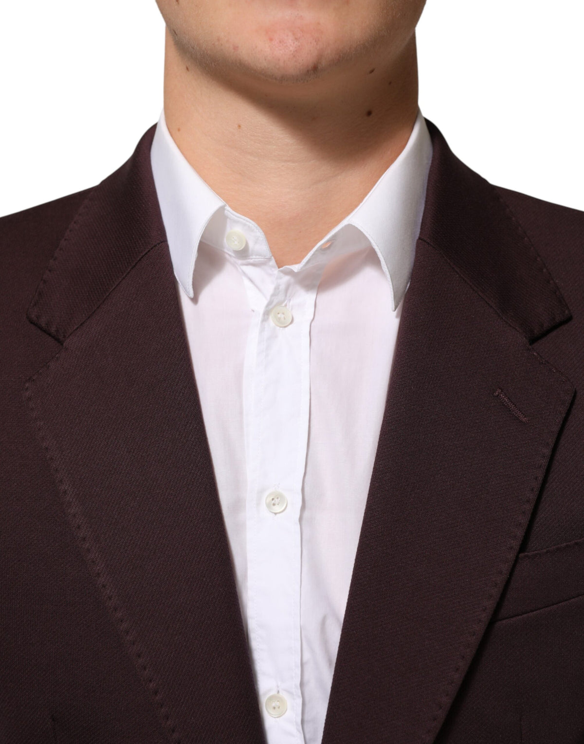 Elevate your wardrobe with the Dolce & Gabbana Maroon Cotton Blazer, a symbol of Italian craftsmanship that embodies timeless elegance and sophisticated allure.
