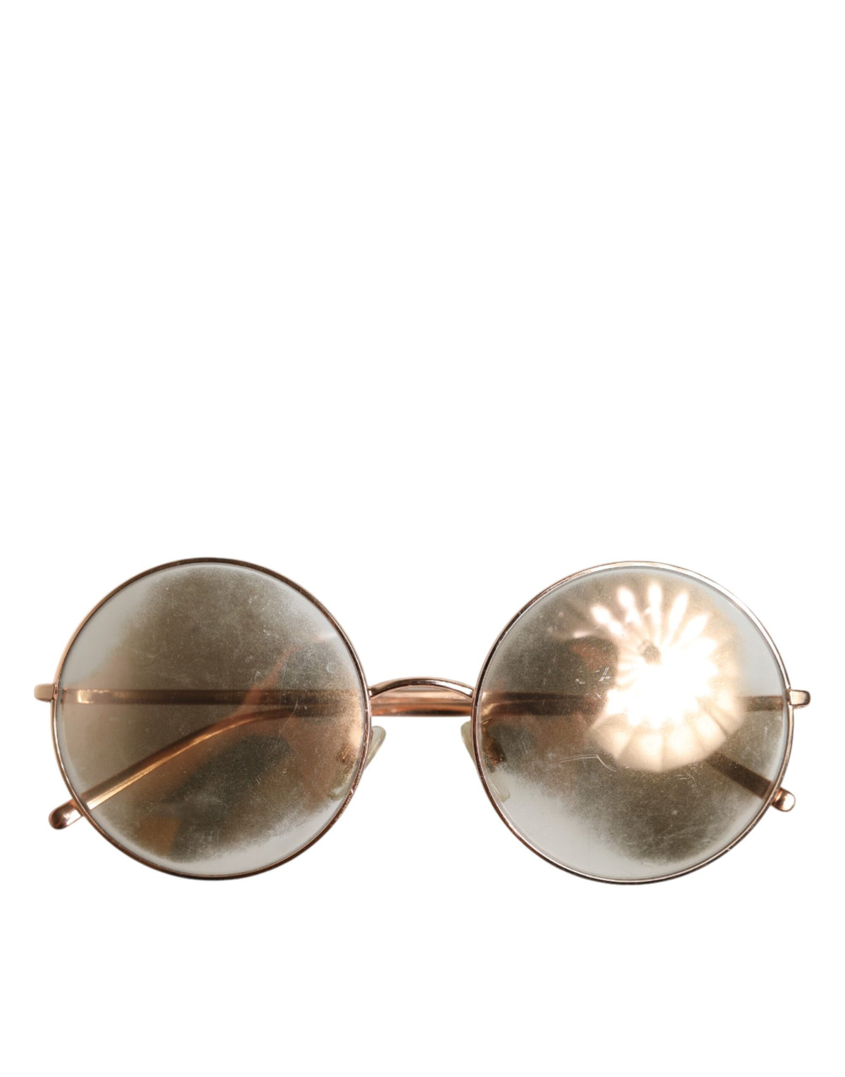 Indulge in the elegance of Dolce & Gabbana's Rose Gold Plated Round Lenses Sunglasses, where exquisite Italian craftsmanship meets timeless luxury for the discerning individual.
