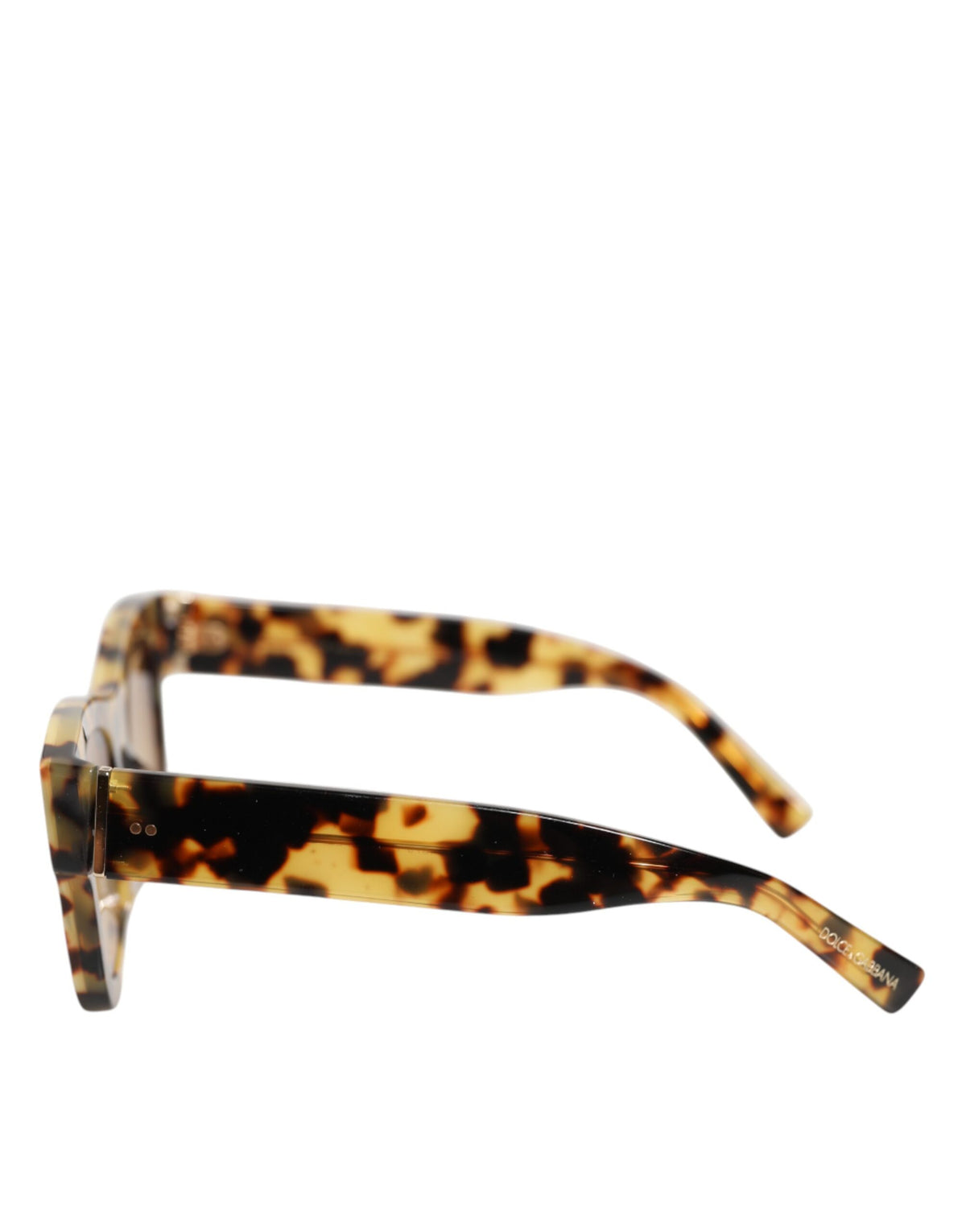 Indulge in the exquisite Dolce & Gabbana DG4379F sunglasses, crafted from premium Italian acetate, embodying timeless elegance and sophisticated allure for the discerning individual.