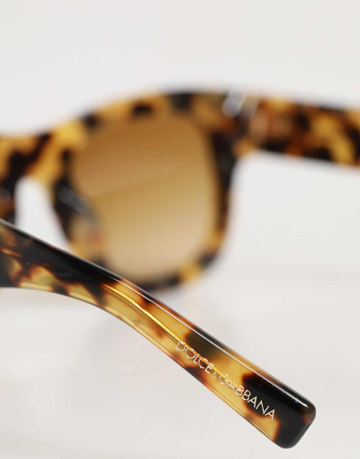 Indulge in the exquisite Dolce & Gabbana DG4379F sunglasses, where luxurious Italian acetate meets a striking design, embodying elegance and sophistication for the discerning individual.