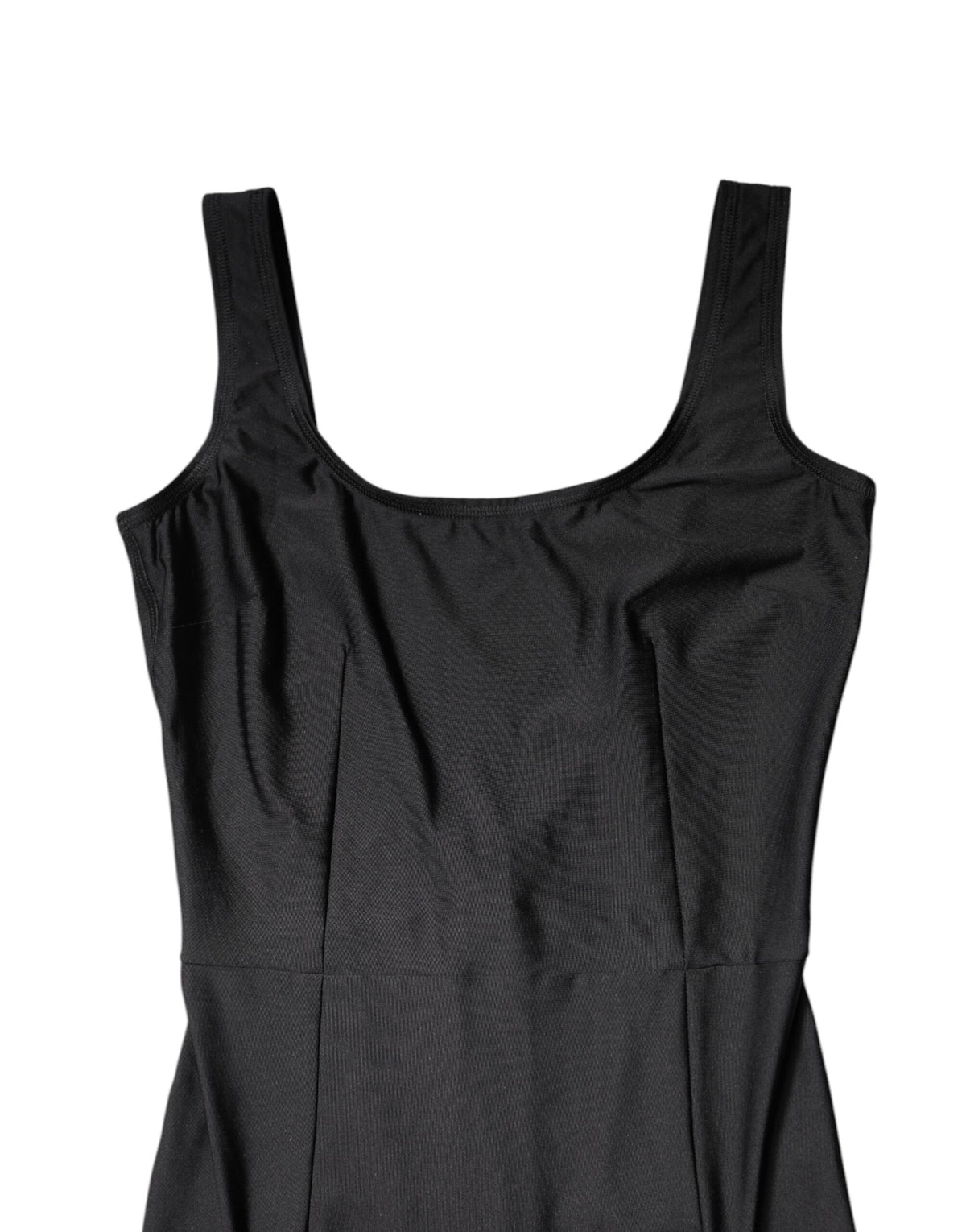 Indulge in the exquisite Dolce & Gabbana Black Sleeveless Bodycon Jumpsuit Dress, crafted in Italy with luxurious materials for a timeless elegance that embodies sophistication.