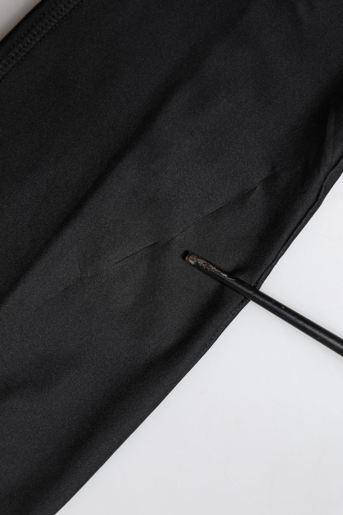 Indulge in the exquisite Dolce & Gabbana Black Sleeveless Bodycon Jumpsuit Dress, crafted from luxurious materials, embodying elegance and sophistication for the discerning individual.