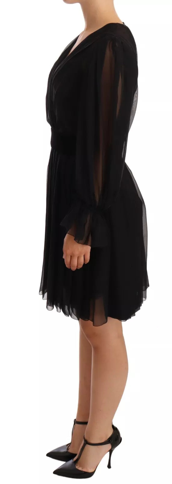 Indulge in the exquisite allure of the Dolce & Gabbana Black Silk Tulle Long Sleeve V-neck Dress, a masterpiece of Italian craftsmanship designed for unforgettable moments.