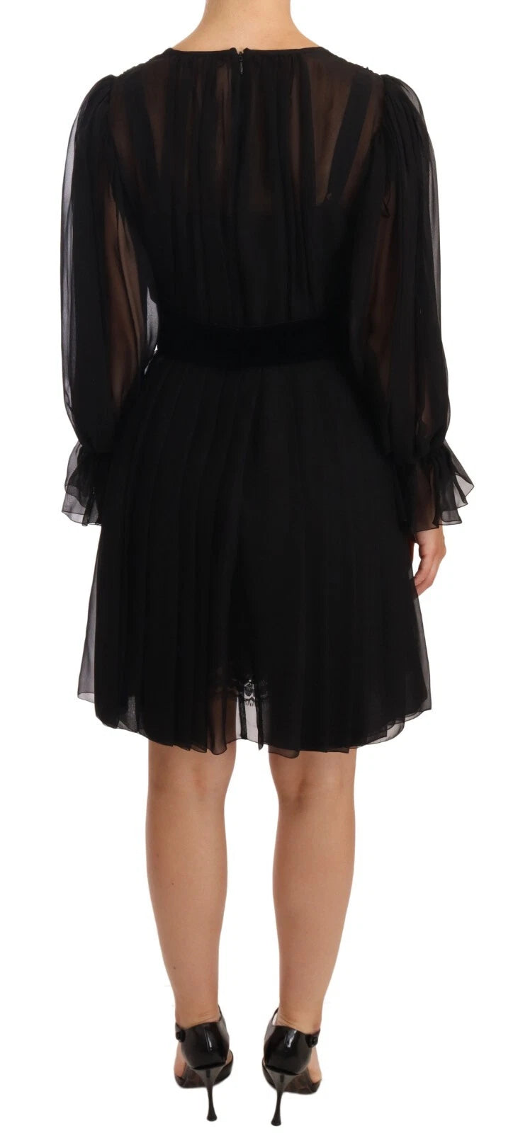 Indulge in the exquisite allure of the Dolce & Gabbana Black Silk Tulle Long Sleeve V-neck Dress, a masterpiece of Italian craftsmanship that redefines elegance for unforgettable evenings.