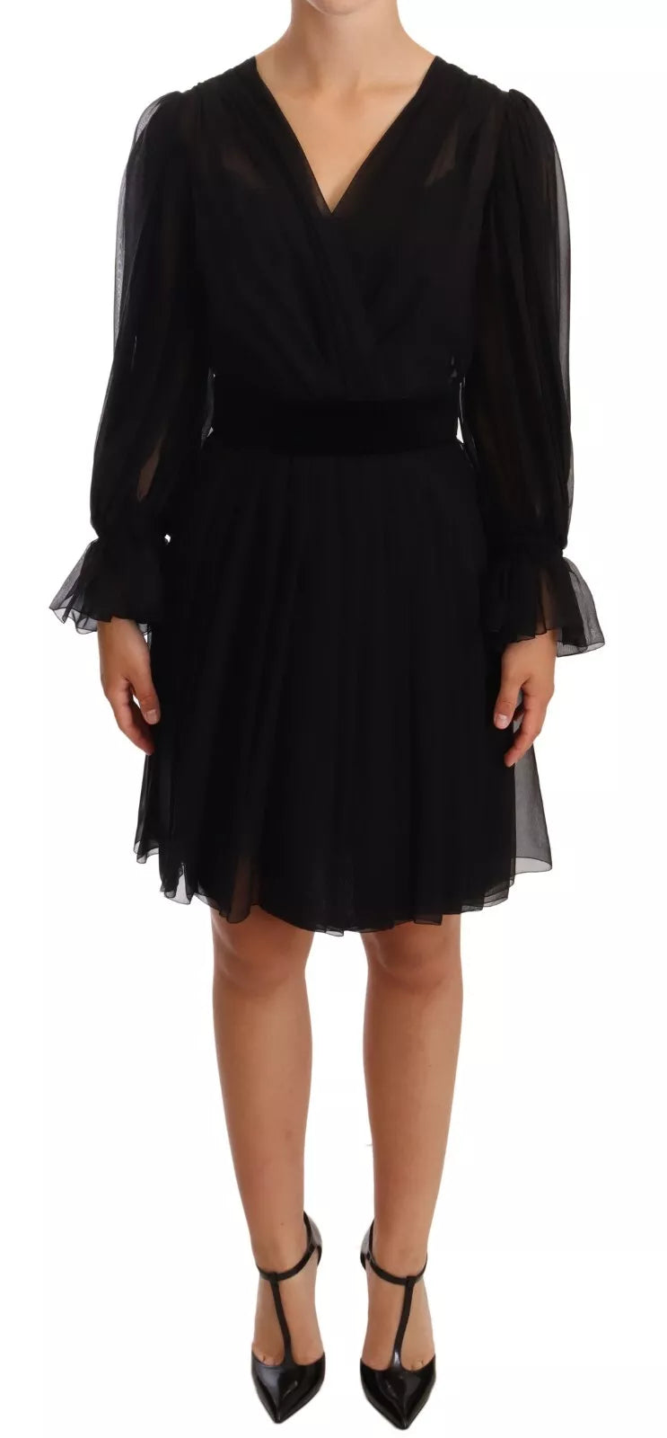 Indulge in the exquisite allure of the Dolce & Gabbana Black Silk Tulle Long Sleeve V-neck Dress, a masterpiece of Italian craftsmanship that embodies timeless elegance and sophistication for unforgettable moments.