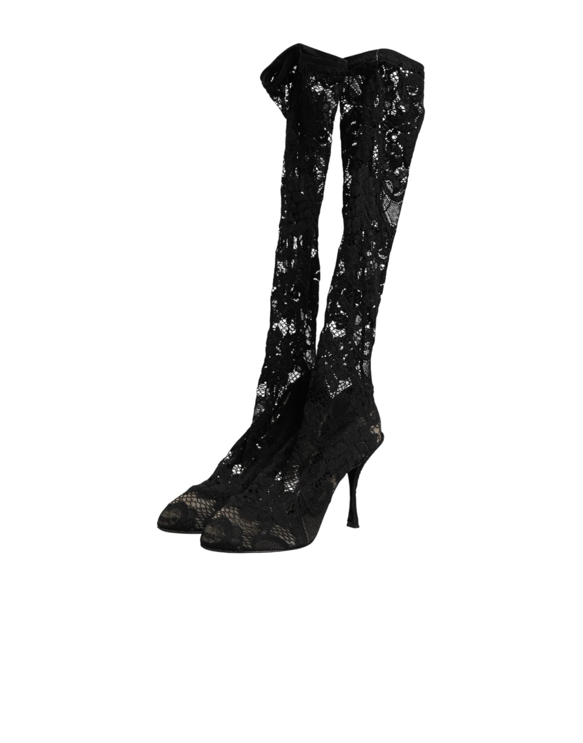Indulge in the exquisite allure of Dolce & Gabbana's Taormina Lace Sock Boots, where luxurious lace meets impeccable Italian craftsmanship for timeless elegance.