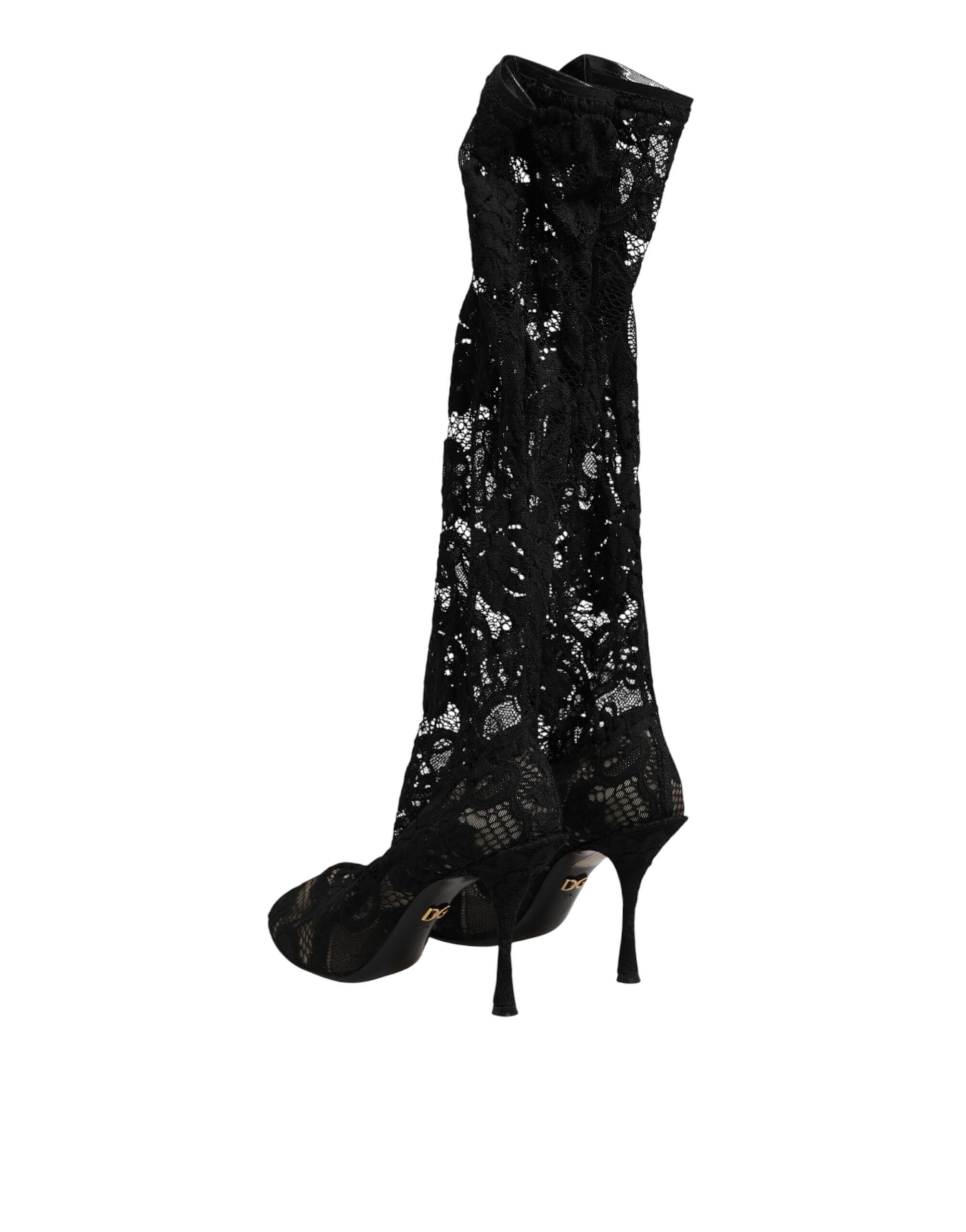 Indulge in the exquisite allure of Dolce & Gabbana's Taormina Lace Sock Boots, where luxurious lace meets Italian craftsmanship for an unforgettable statement of elegance.