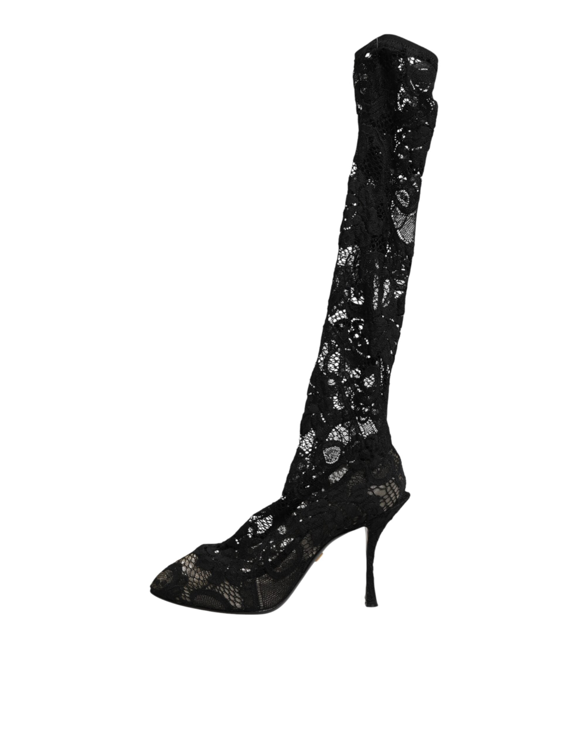 Indulge in the exquisite allure of Dolce & Gabbana's Taormina Lace Sock Boots, where artisanal craftsmanship meets luxurious materials for timeless sophistication.