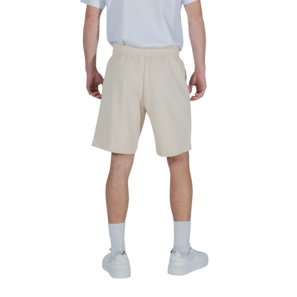 Discover the EA7 Emporio Armani Beige Cotton Bermuda Shorts, where luxurious comfort meets contemporary elegance, perfect for sophisticated leisure and timeless style.