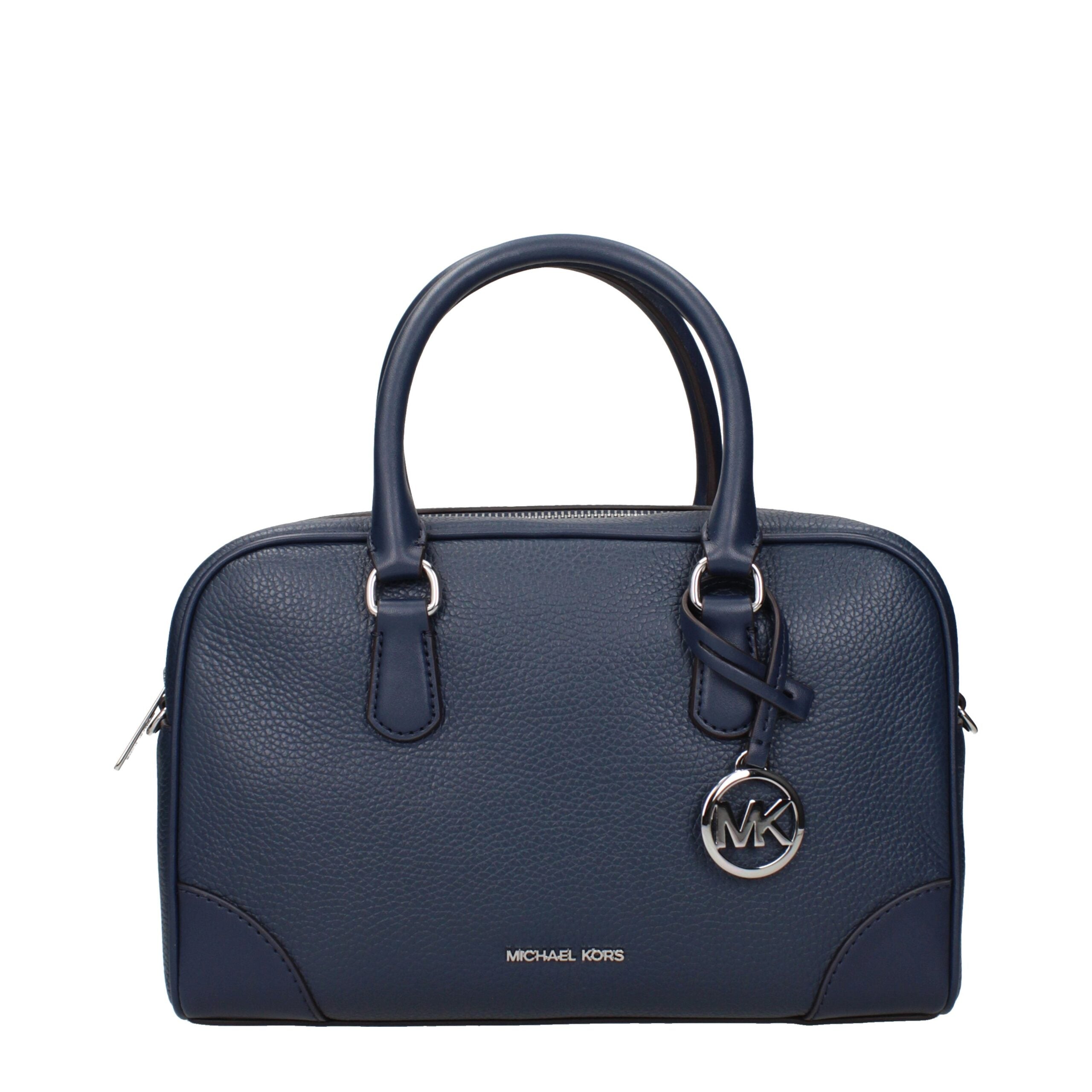 Experience the exquisite allure of the Michael Kors Blue Leather Handbag, a timeless masterpiece that embodies luxury and sophistication for the discerning individual.