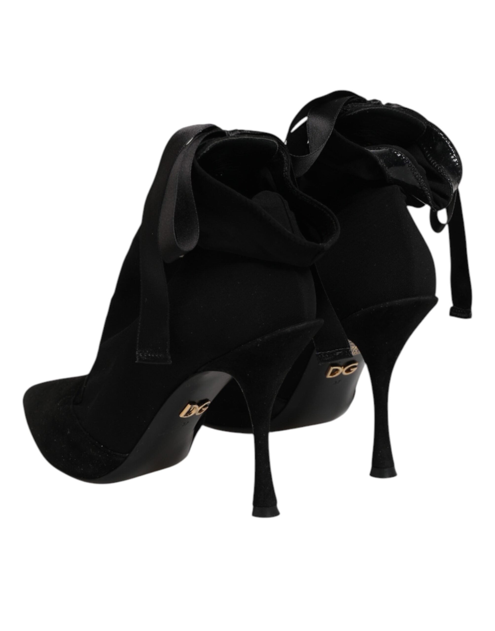Elevate your style with Dolce & Gabbana's Black Stiletto Heels Lace Up Boots, where exquisite craftsmanship meets luxurious materials for the confident modern individual.