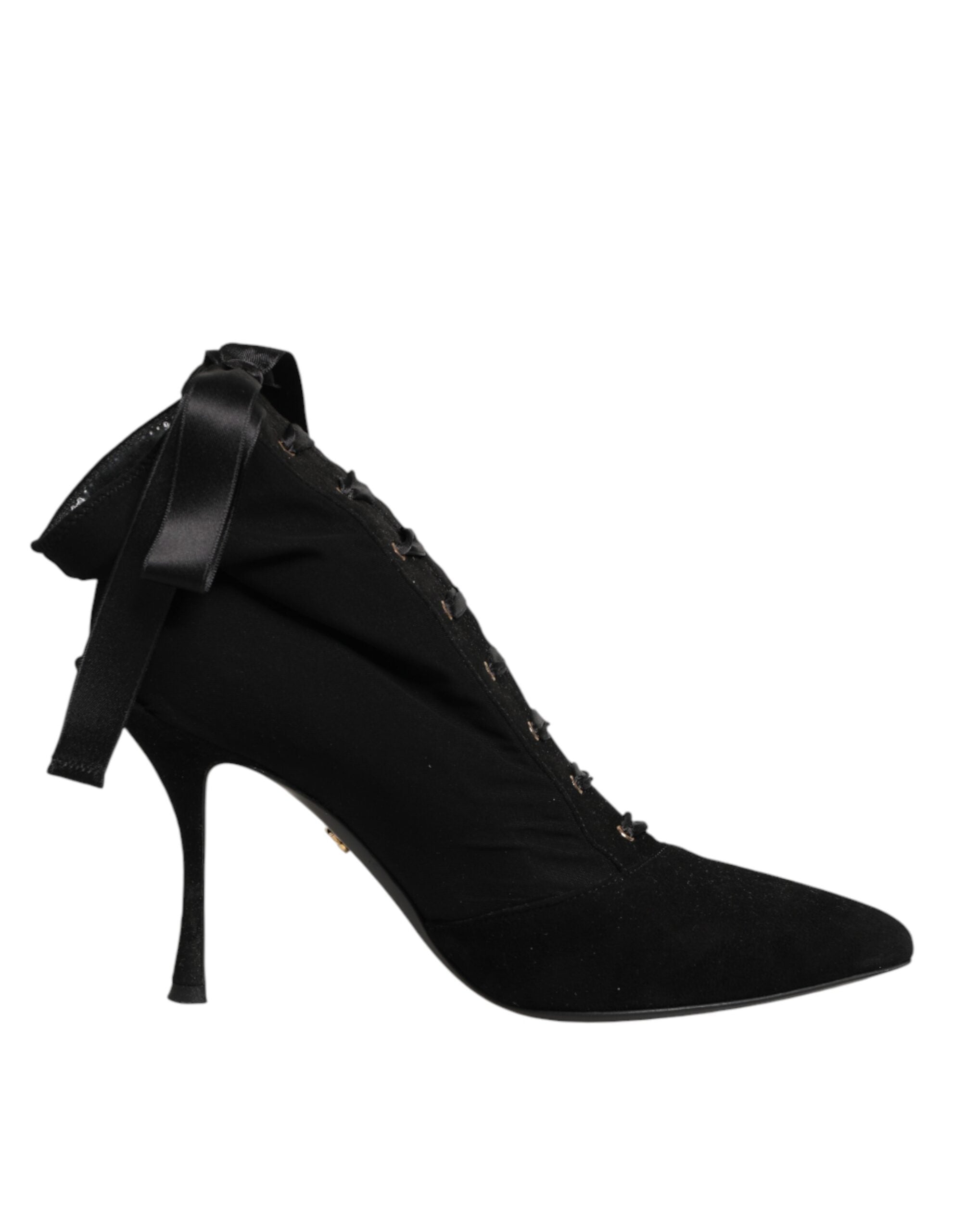 Elevate your style with Dolce & Gabbana's Black Stiletto Heels Lace Up Boots, where exquisite craftsmanship meets luxurious materials for the confident modern individual.