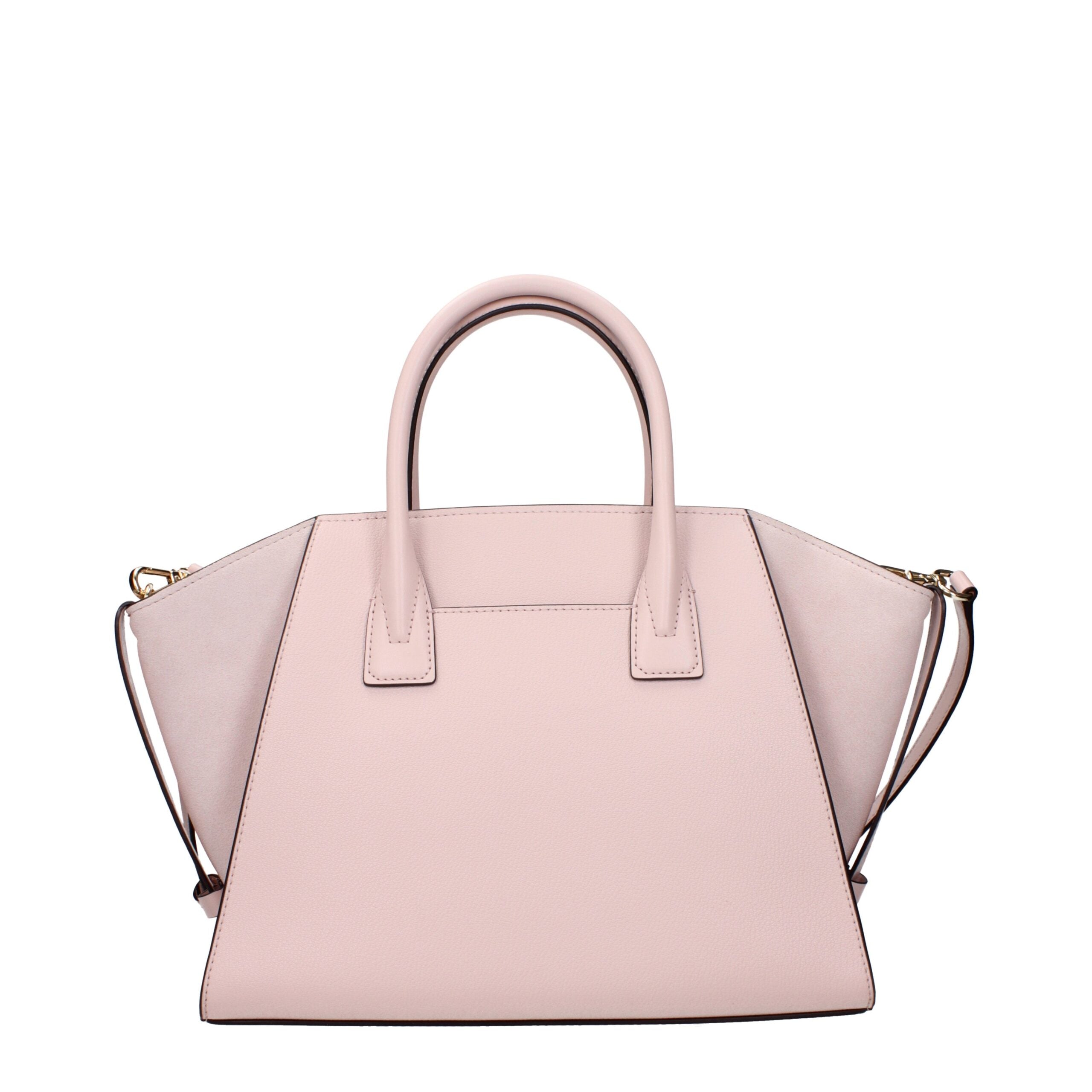 Discover the Michael Kors Pink Leather Handbag, a luxurious statement piece crafted from exquisite leather, embodying modern elegance and timeless sophistication.