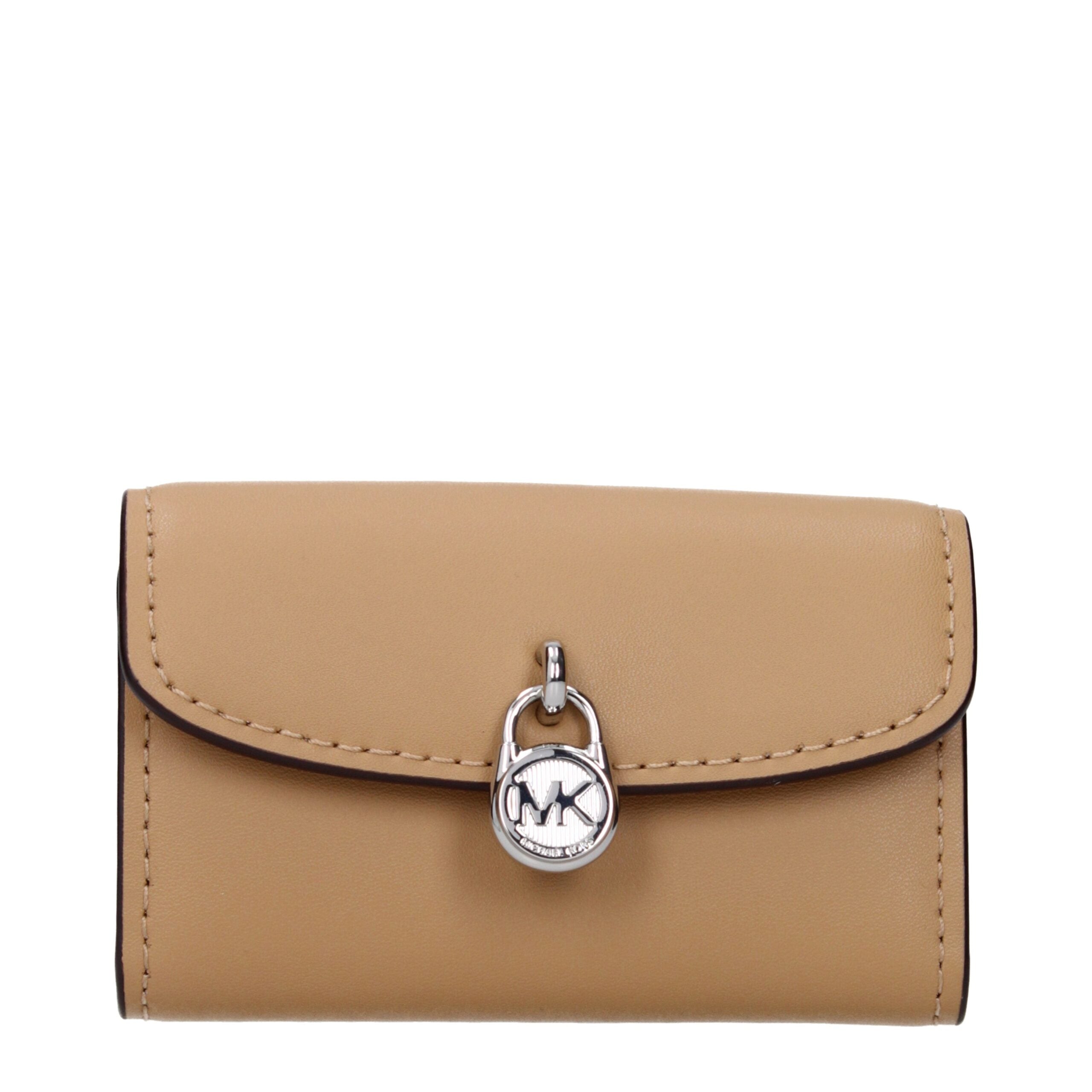 Experience the exquisite Michael Kors Brown Leather Wallet, a testament to artisanal craftsmanship and timeless elegance, perfect for the discerning individual.