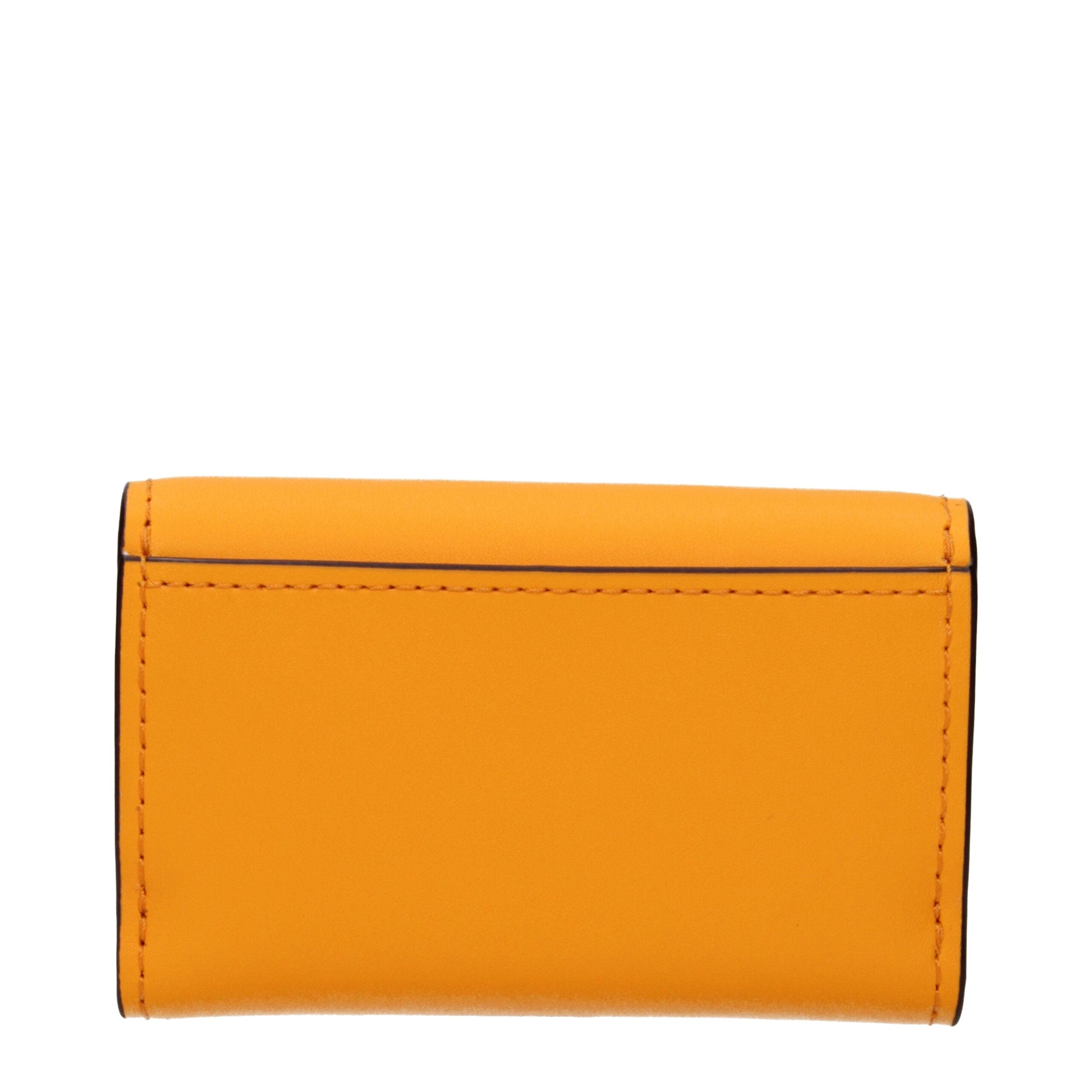 Experience the exquisite allure of the Michael Kors Orange Leather Wallet, a testament to artisanal craftsmanship and timeless elegance for the discerning individual.