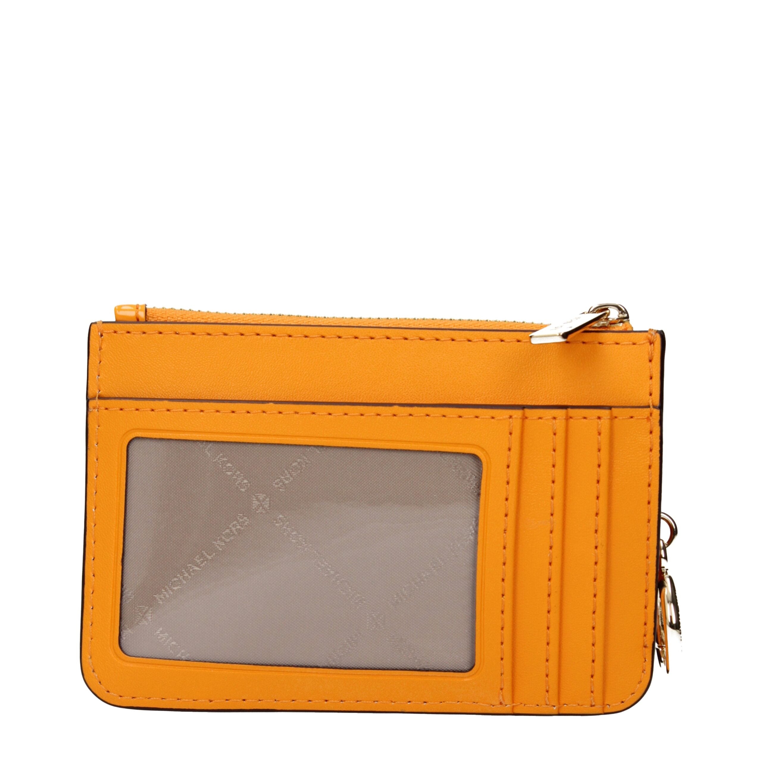 Elevate your style with the Michael Kors Orange Leather Wallet, a luxurious accessory crafted from vibrant patent leather, embodying exquisite craftsmanship and modern elegance.