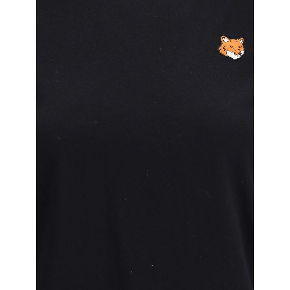 Elevate your wardrobe with the Maison Kitsuné Black Cotton T-Shirt, crafted from soft organic cotton for timeless elegance and effortless sophistication.