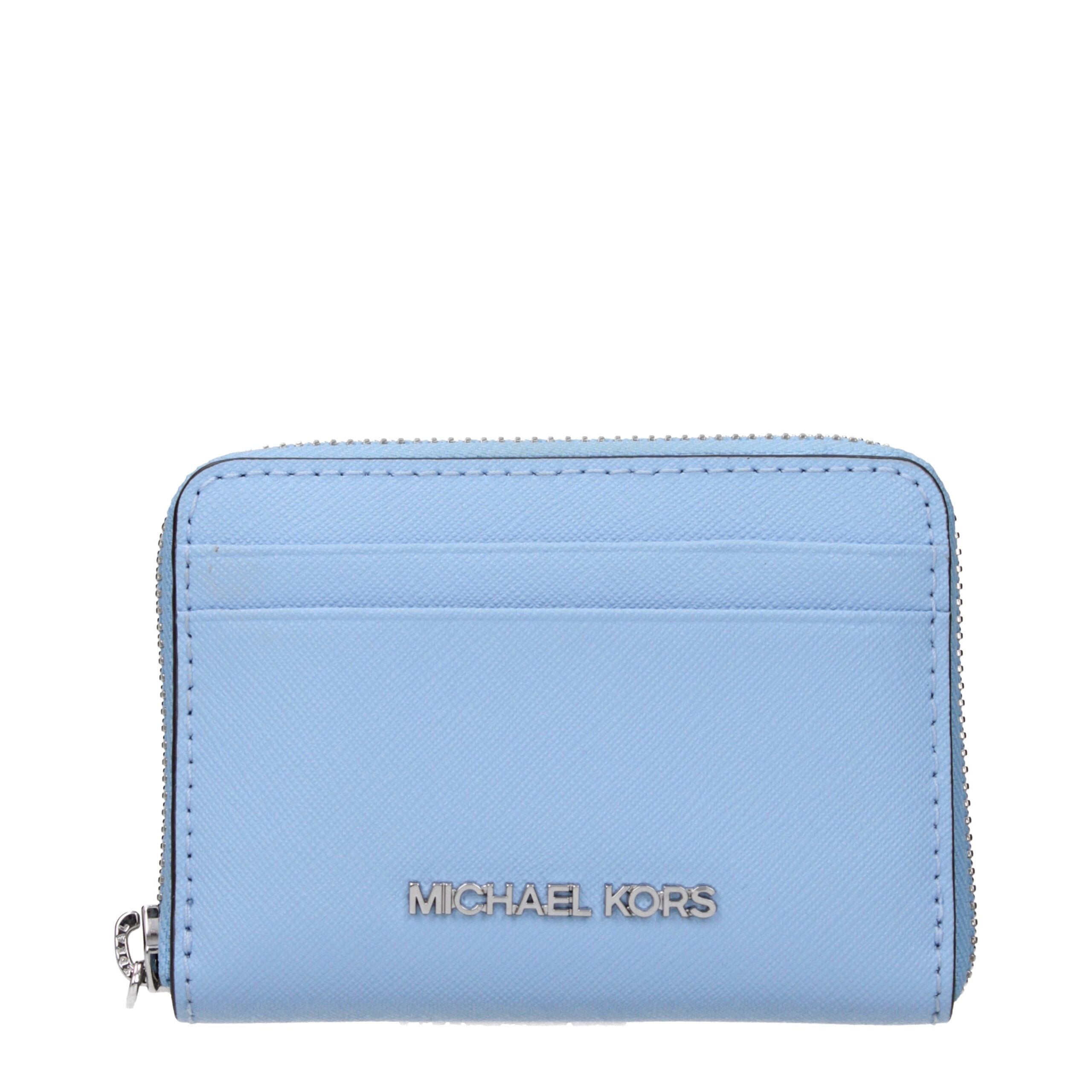 Indulge in the exquisite elegance of the Michael Kors Light Blue Leather Cardholder, a timeless essential that embodies luxury and sophistication for the discerning individual.