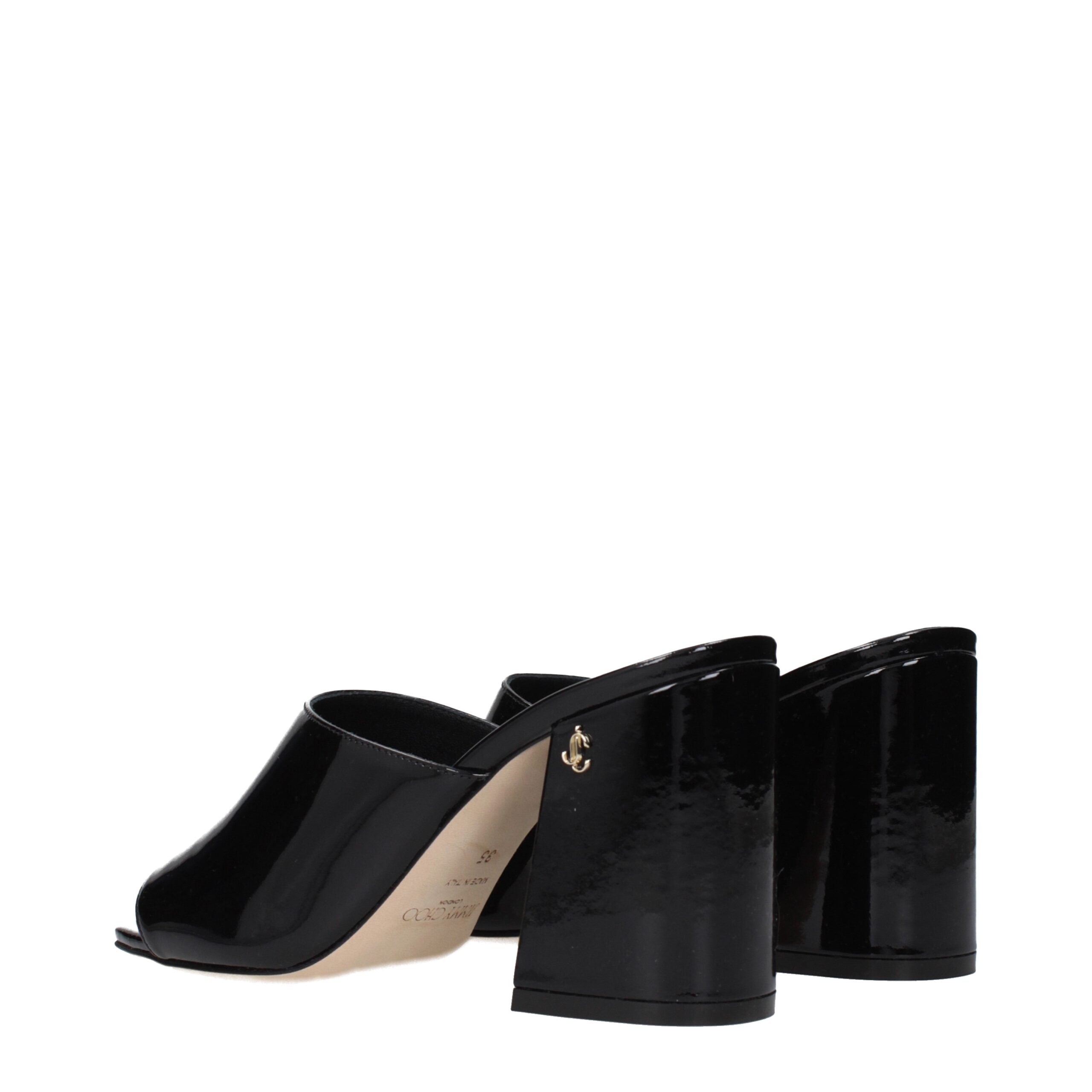 Indulge in the exquisite craftsmanship of Jimmy Choo Black Leather Platform Sandals, where luxurious patent leather meets timeless elegance, perfect for every sophisticated occasion.