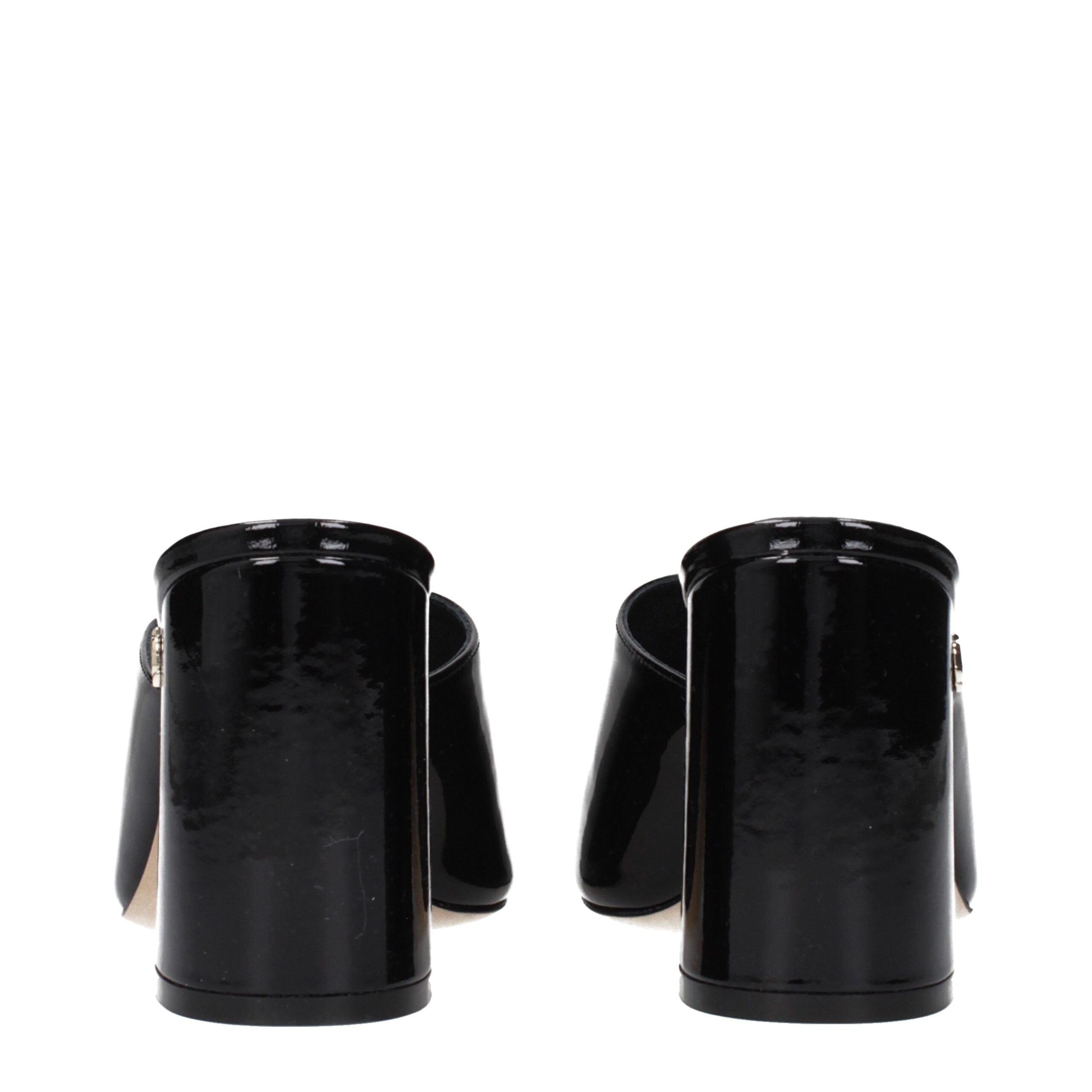Indulge in the exquisite craftsmanship of Jimmy Choo Black Leather Platform Sandals, where luxurious patent leather meets timeless elegance, perfect for every sophisticated affair.