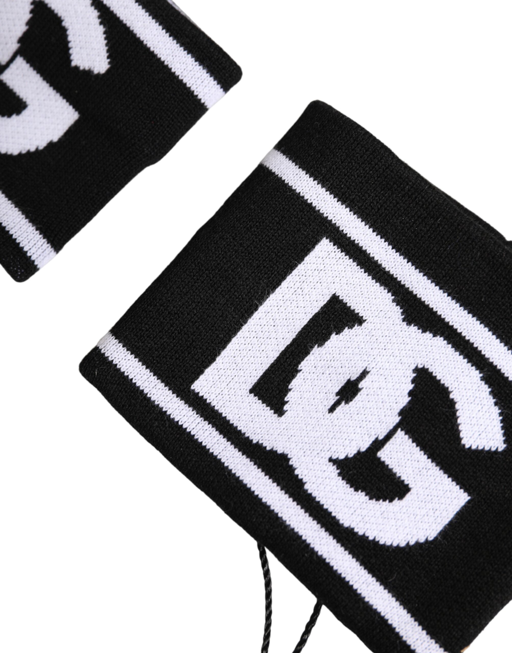 Indulge in the Dolce & Gabbana Black White DG Logo Cotton Wristband, a luxurious blend of soft cotton and Italian craftsmanship, embodying sporty elegance for the discerning individual.