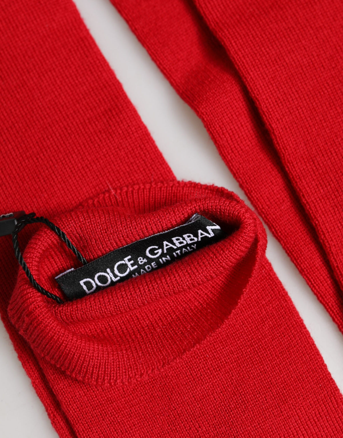 Elevate your style with Dolce & Gabbana's Red Wool Fingerless Elbow-Length Mitten Gloves, a testament to Italian craftsmanship and timeless elegance for the discerning individual.